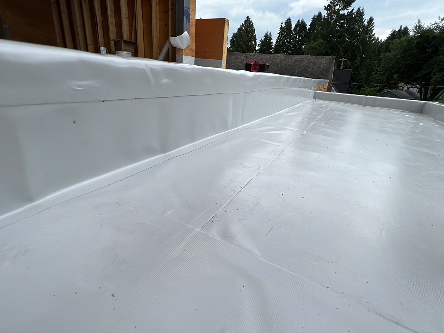 Residential Roofing Installation using Durolast roofing membrane by Top Notch Roofing Inc
