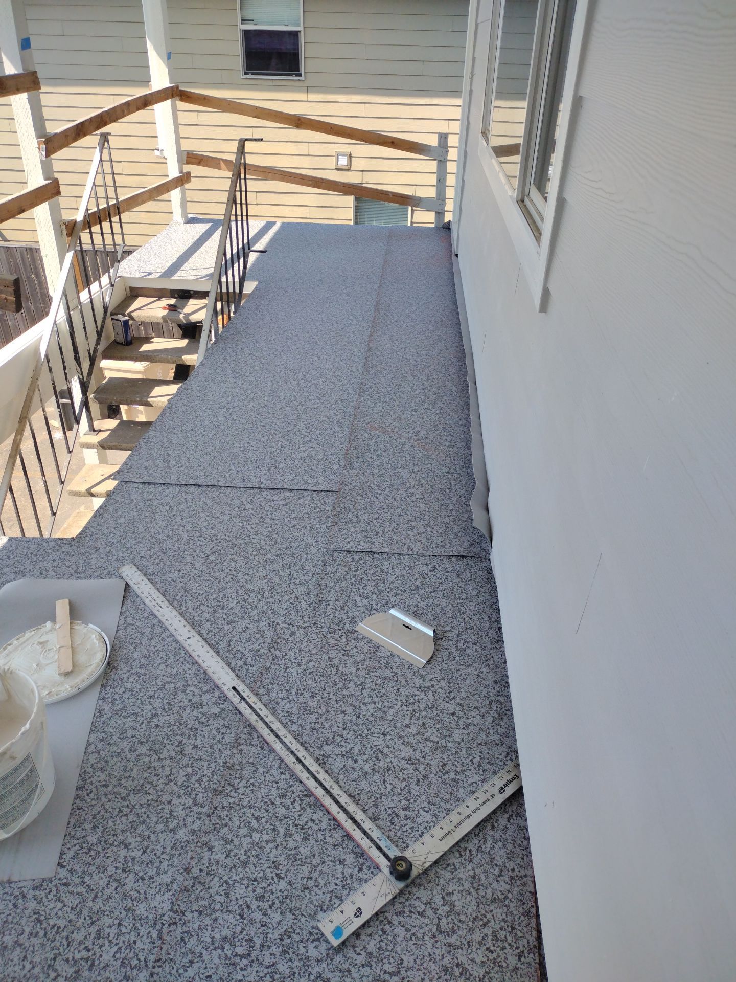 Dec-Tec Walkable Membrane using Dec-Tec (Color: Granite) by Orezona Building & Roofing Company, Inc.