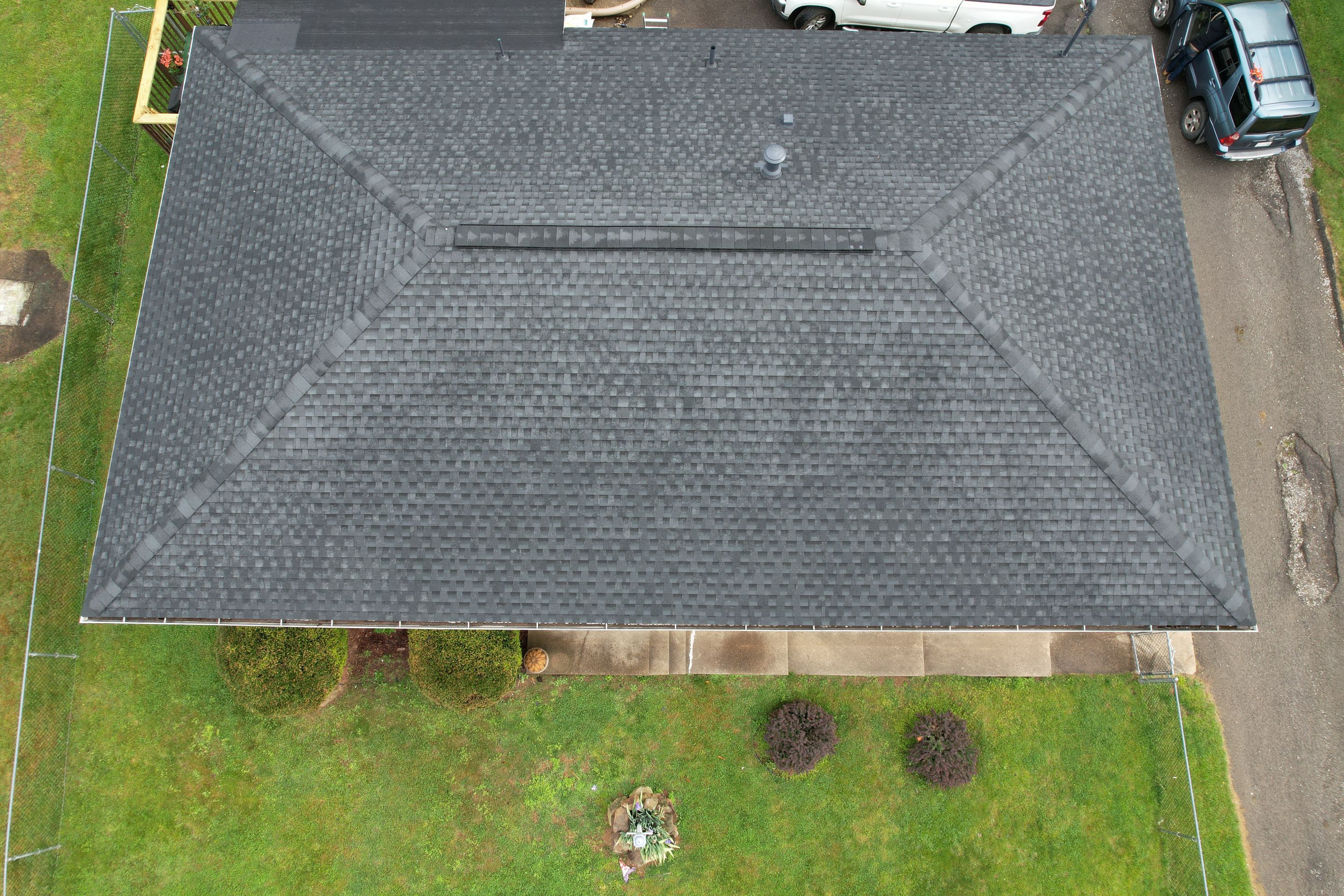 Residential Roofing Installation using GAF Timberline HDZ Charcoal by Rainstoppers Roofing