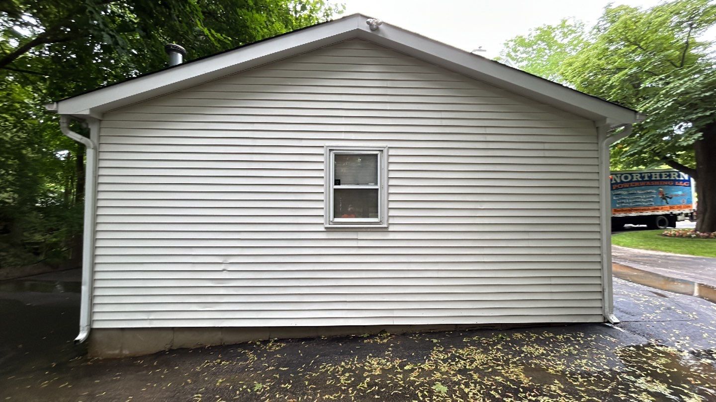 Housewashing  using Algaecide, soft wash soap by Northern Power Washing LLC.