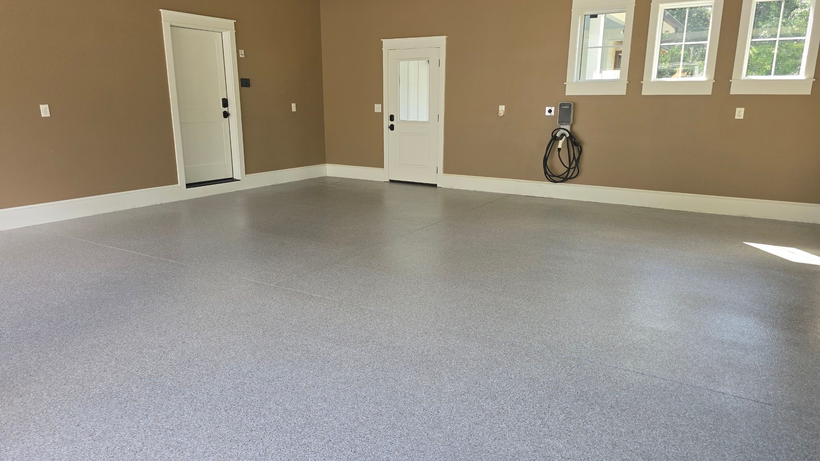 Front Porch & Garage Using Creekbed by Elite Floor Solutions