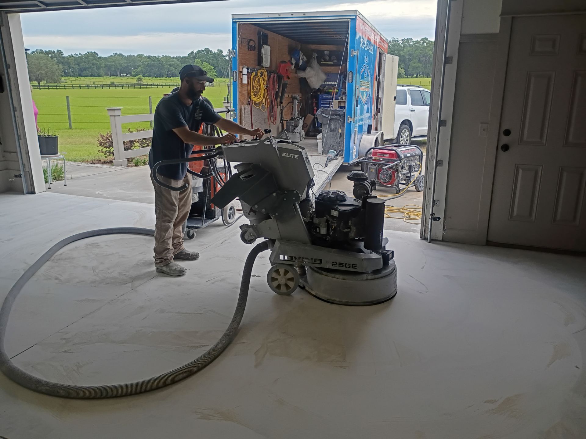 Garage in Mount Everest by Cross Creek Concrete Coatings