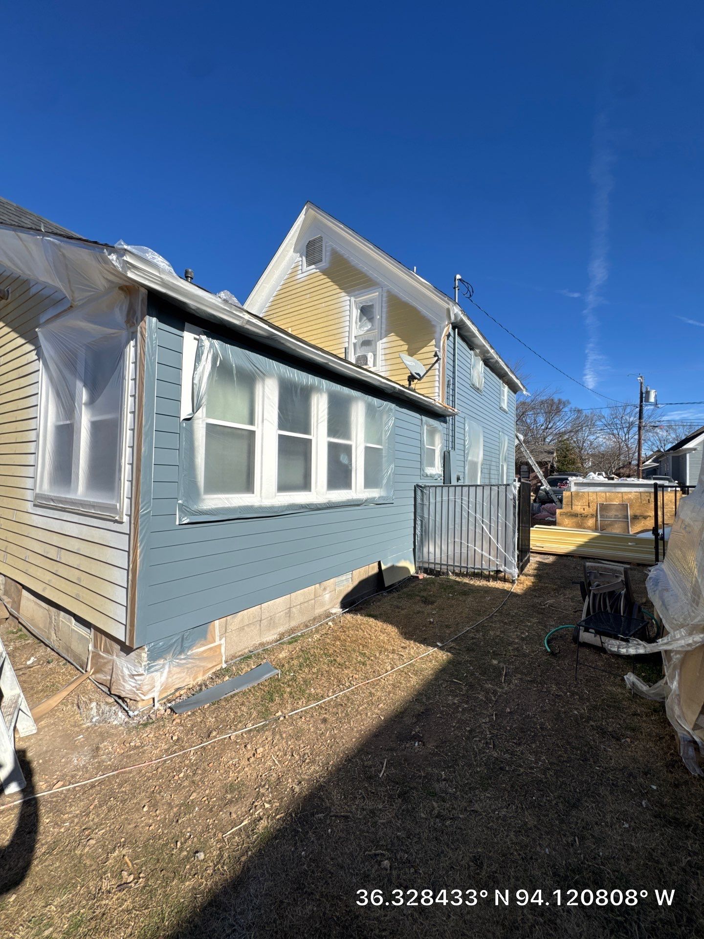 Siding, New Deck and Paint - Rogers by Complete Roofing and Restoration Solutions