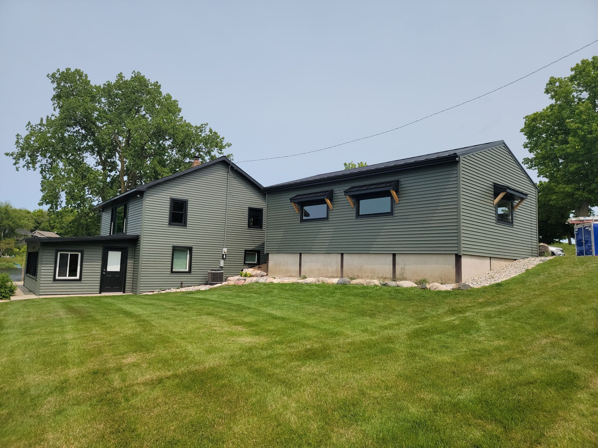 ROOF, SIDING AND SOFFIT INSTALLATION by Avalon Roofing and Exteriors