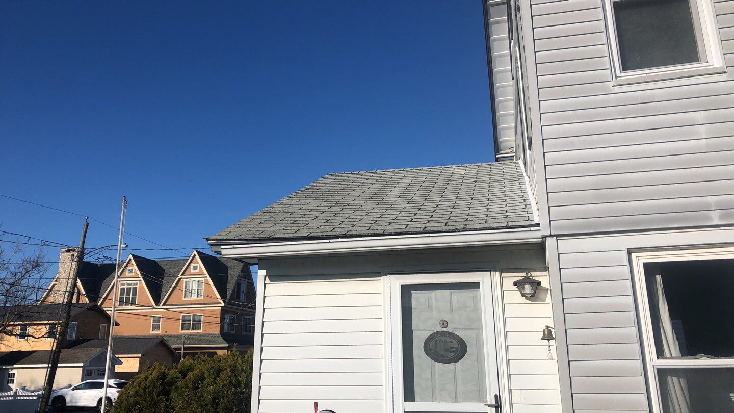 Residential Roofing Installation using Owens Corning Duration Slatestone Gray by A Plus Exterior