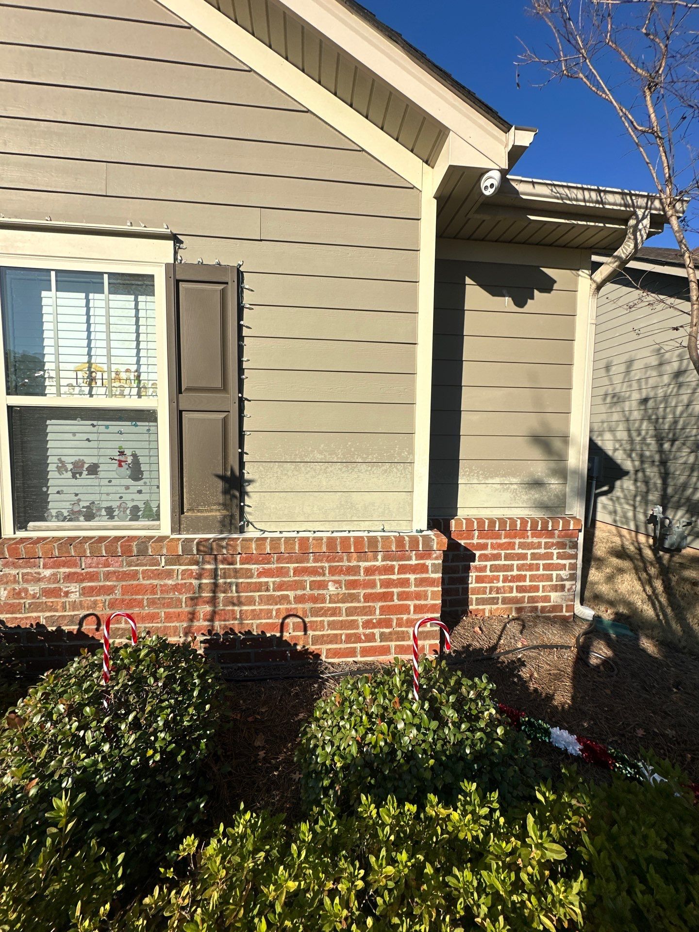 the service being done is cleaning the siding and brickwork to restore the surfaces to their original appearance