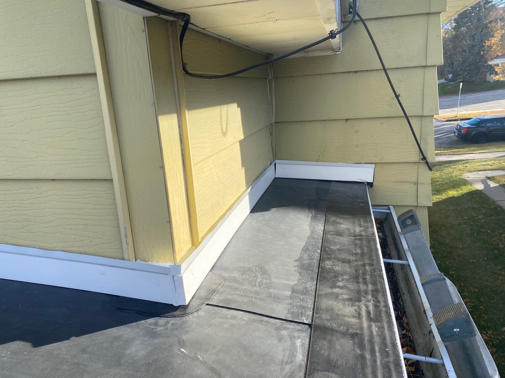 Flat Roof Porch with 60mil EPDM Rubber by Gellings Roofing & Siding