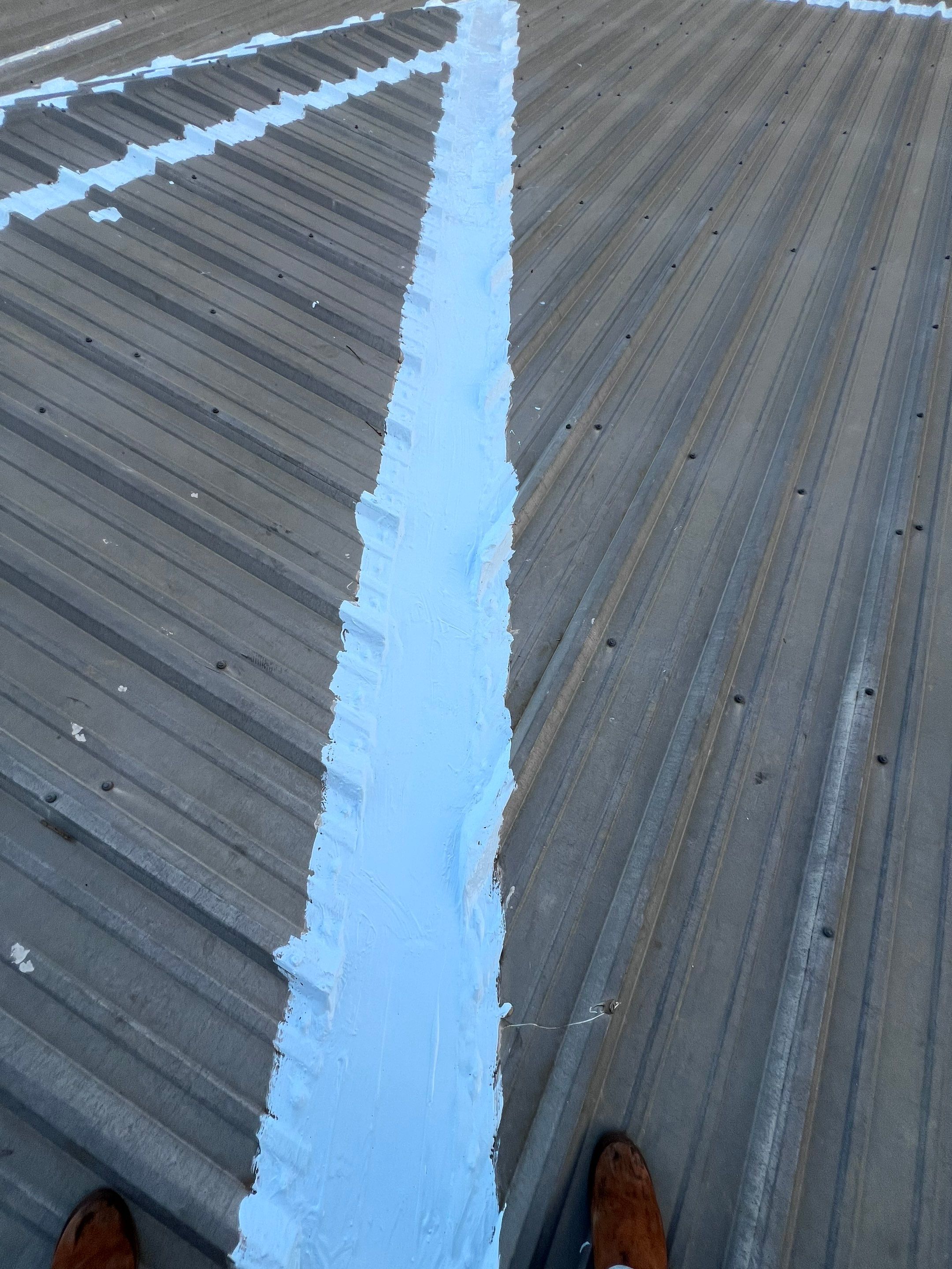 Hail Damage using Metal by Roof Repair Company