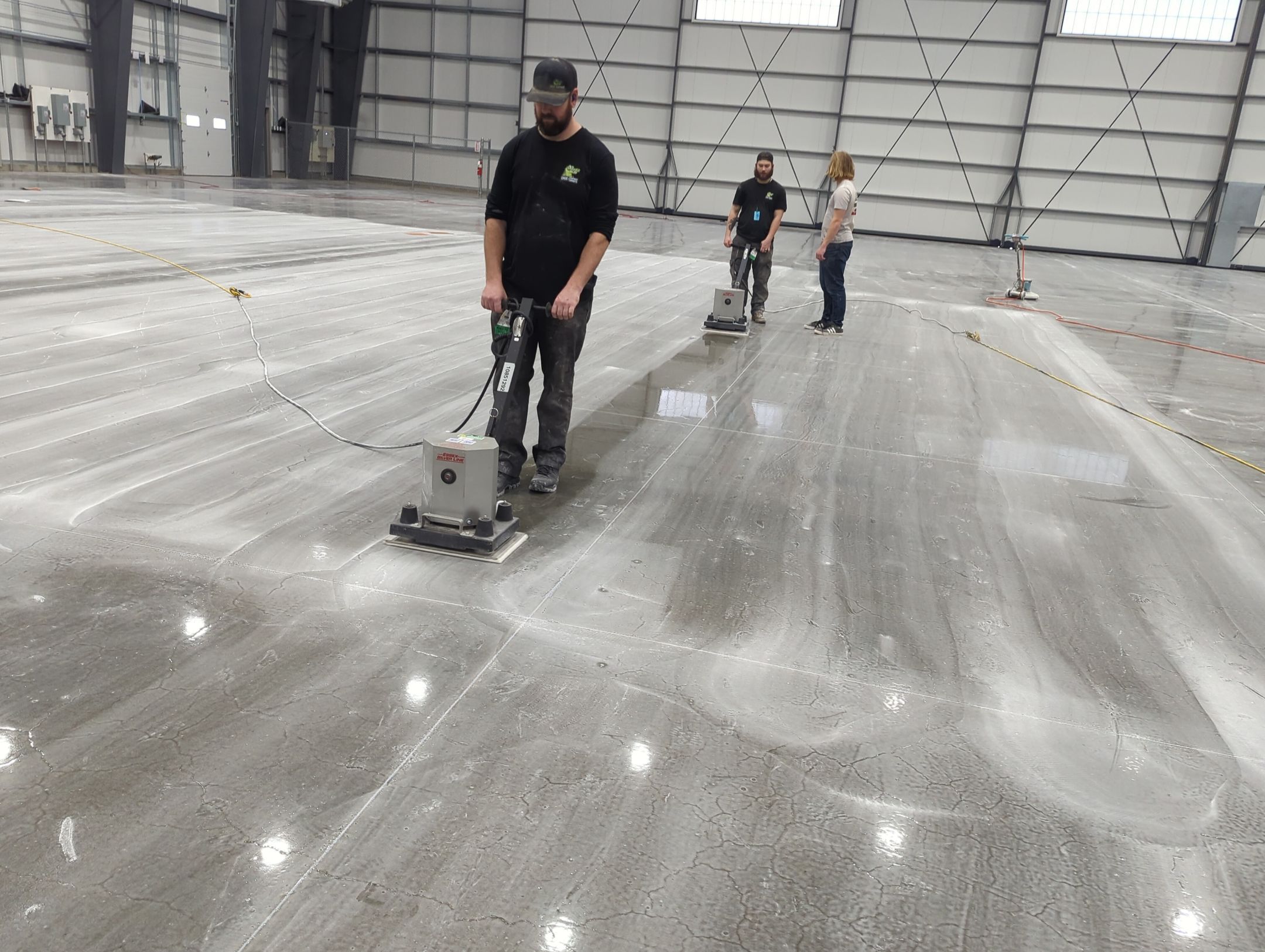 Airplane Hanger using Light Grey Commercial Penntek Epoxy by Croc Coatings, LLC