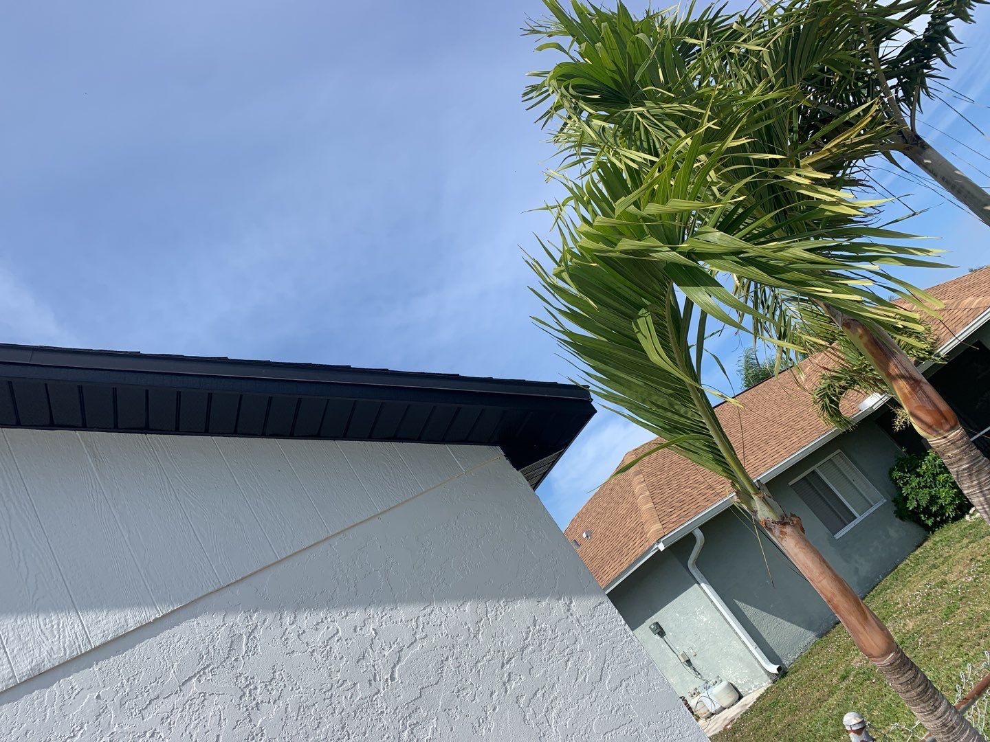 Black Seamless Gutters for Modern Cape Coral Homes by Gutter Professors