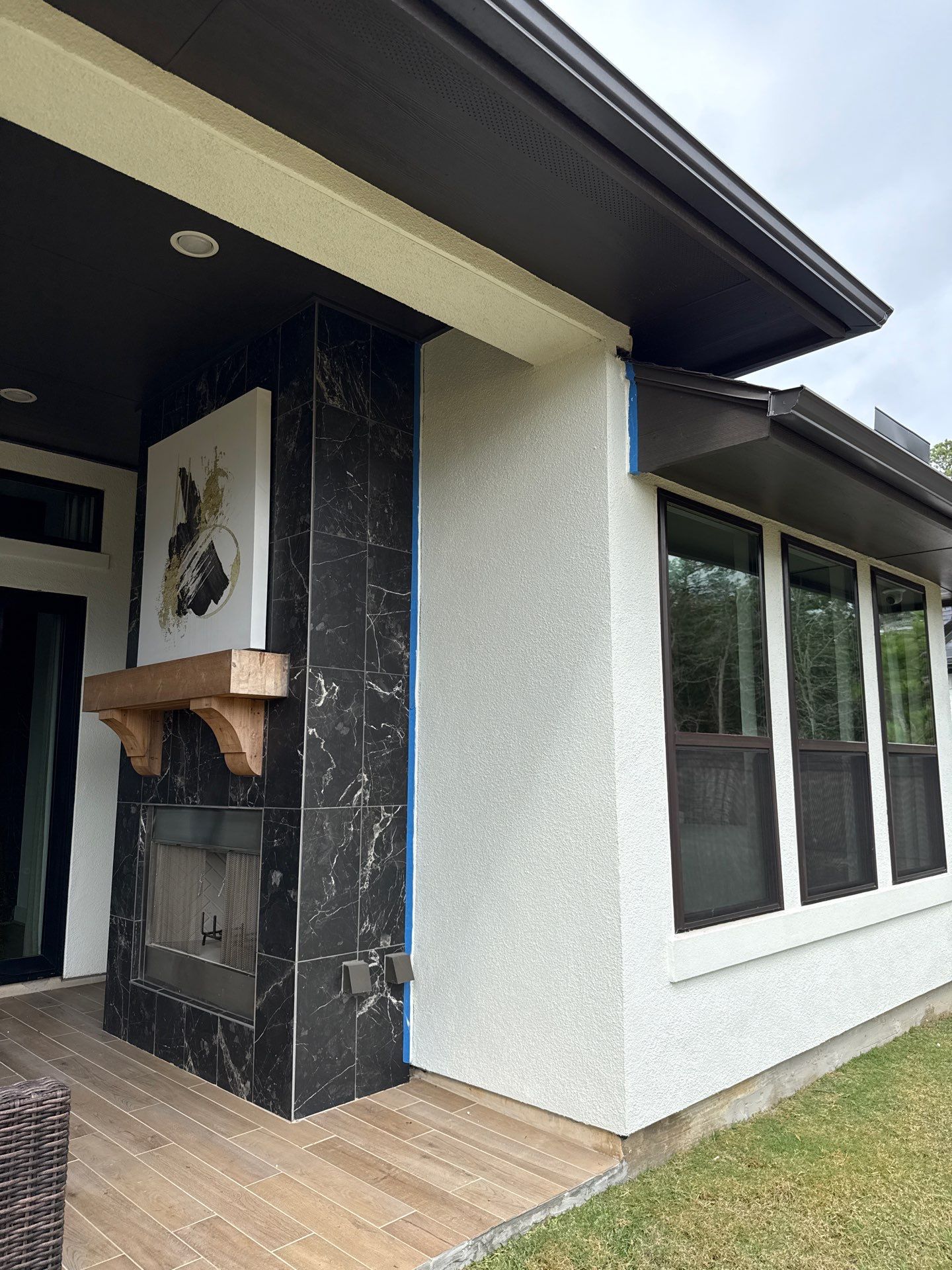 Magnolia Contrast: Light Stucco with Dark Accents and Stone Details by Apex Conventional Stucco Llc