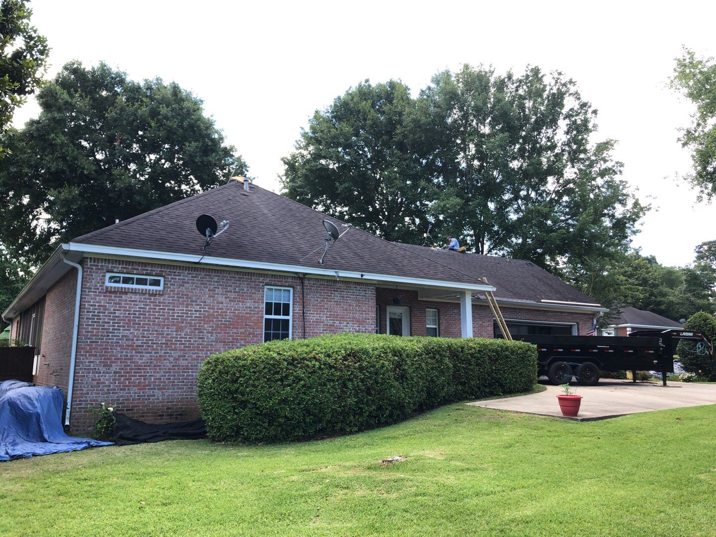 Residential Roofing Installation using Roof Replacement by American Roofing & Construction LLC