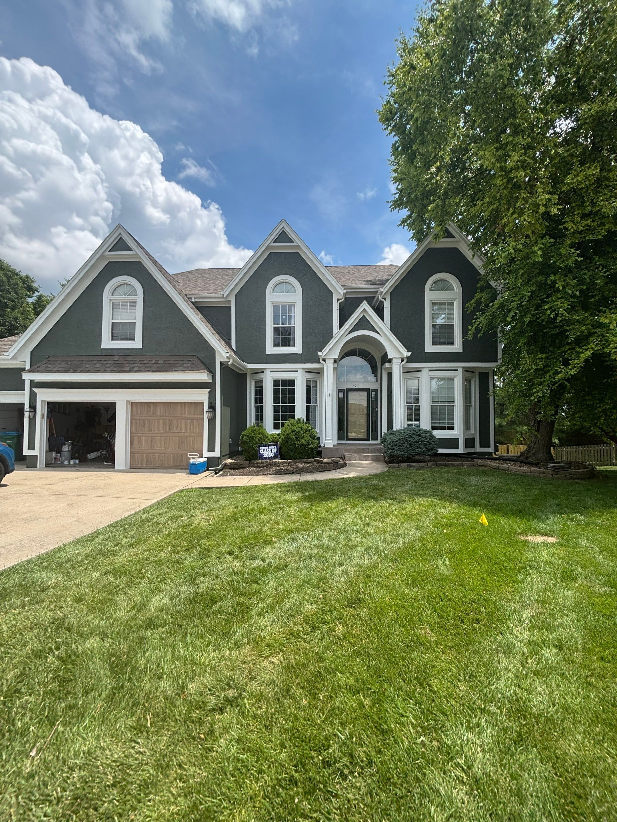 Exterior Painting and Wood Rot Repair for Overland Park Residence by Cougar Painting