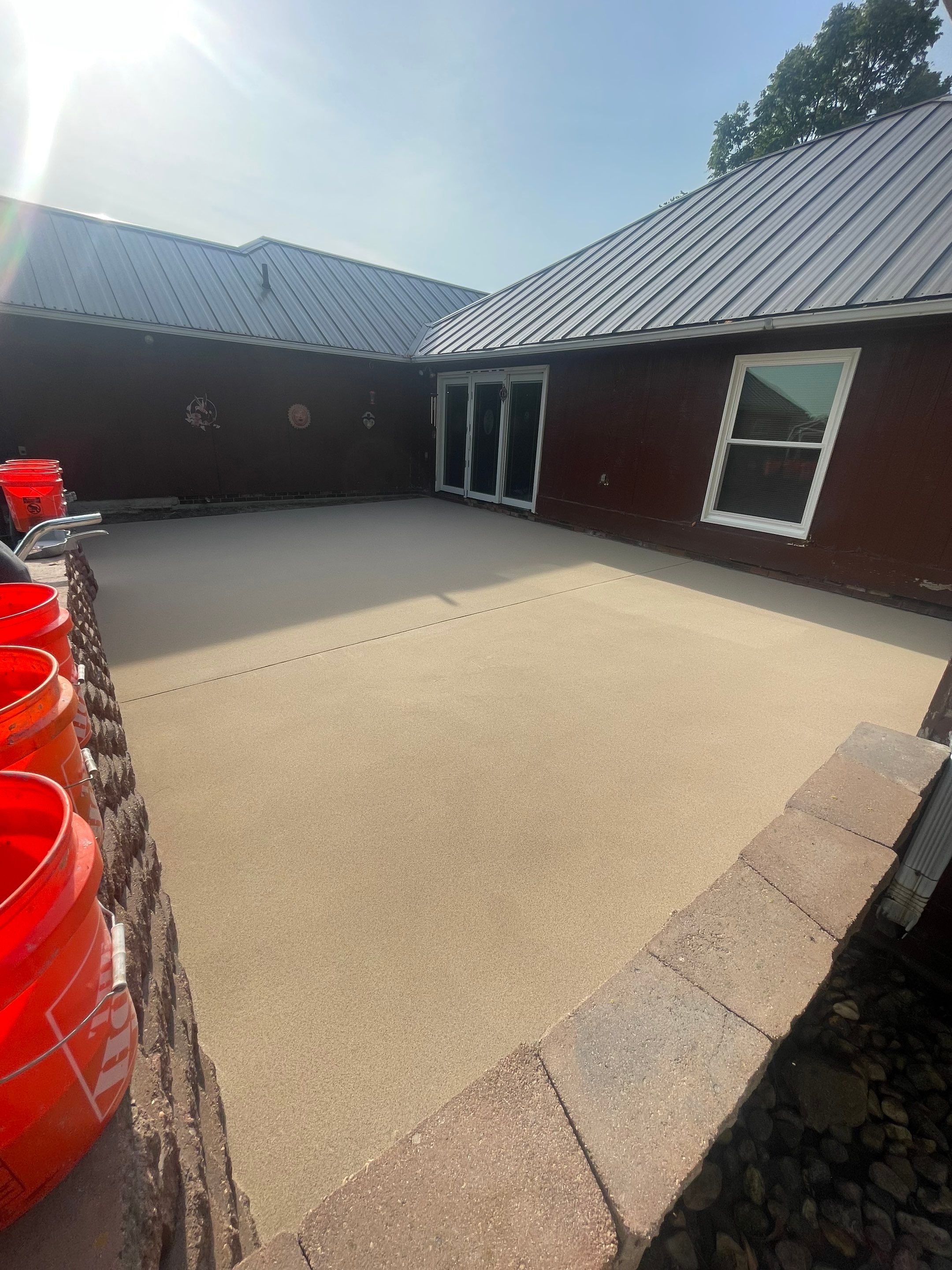 Concrete Patio Resurfacing and Protective Coating in Winfred, South Dakota by Select Painting, Coatings & Garage Cabinets