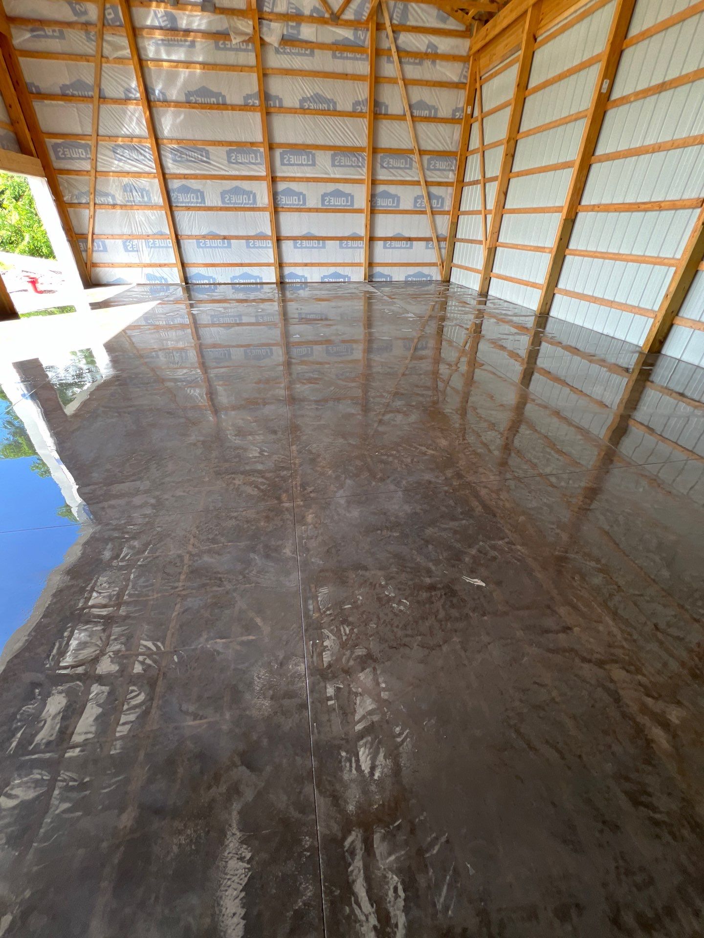 Pole barn floor  by NG Masonry & Construction LLC