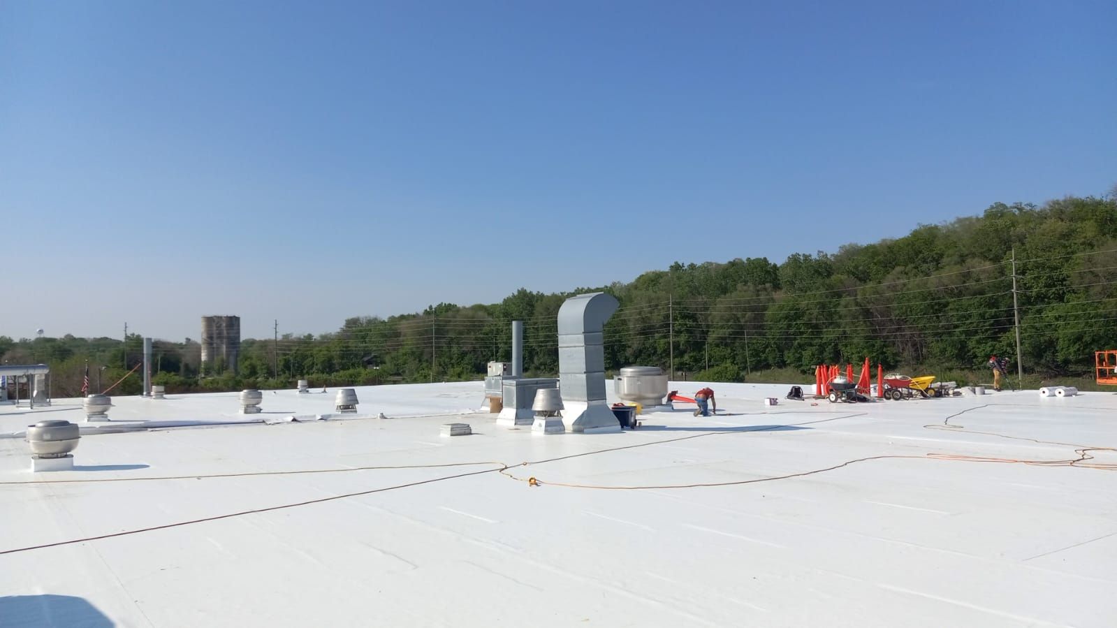 AML Riverside  by Grell Roofing, LLC