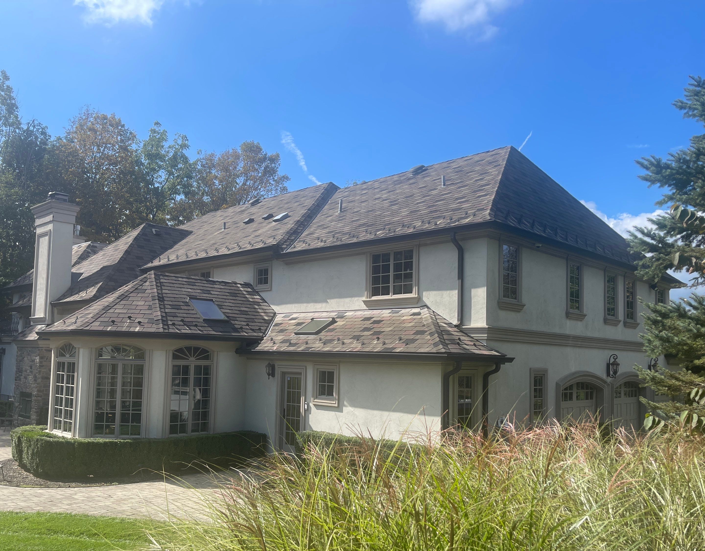 Full Slate - Stucco - Copper Remodel by USA Roof Masters