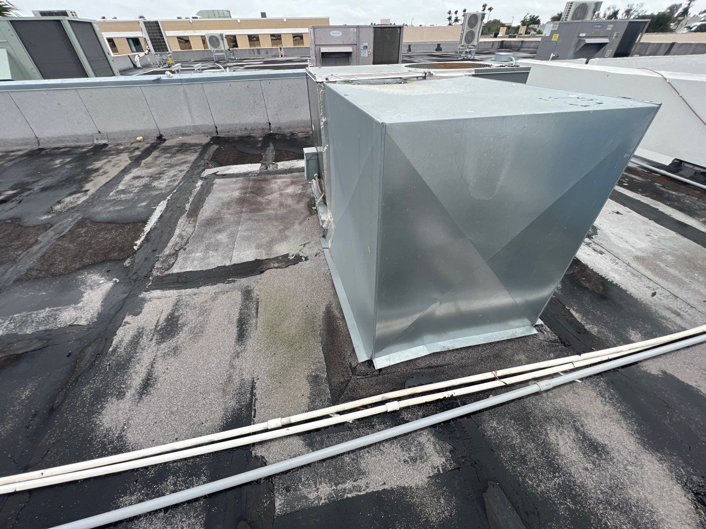 Commercial Roofing Repair using Roof Sealant by Four Peaks Roofing