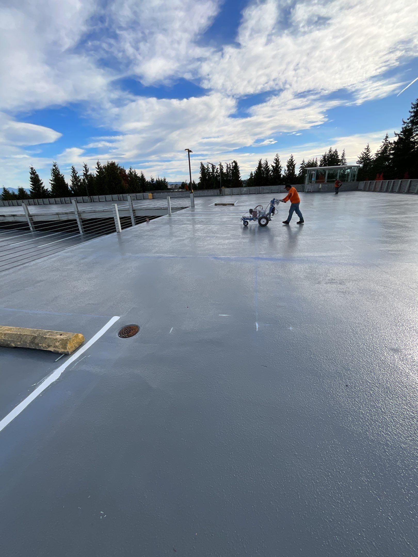 Corti Construction | Striping for Concrete Parking Lot by Jireh Asphalt & Concrete Inc 