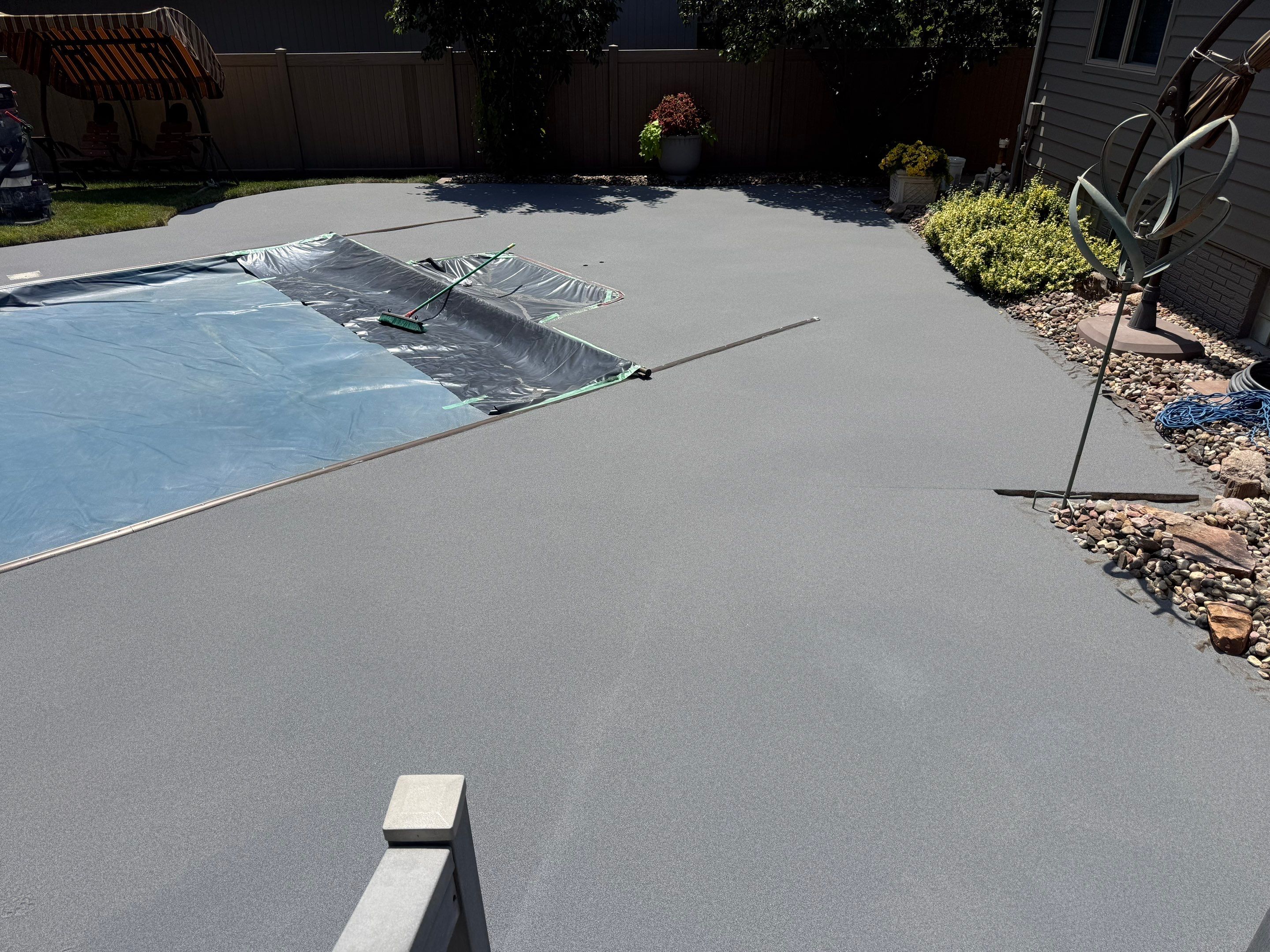 Residential Pool Deck Resurfacing in Sioux Falls by Select Painting, Coatings & Garage Cabinets