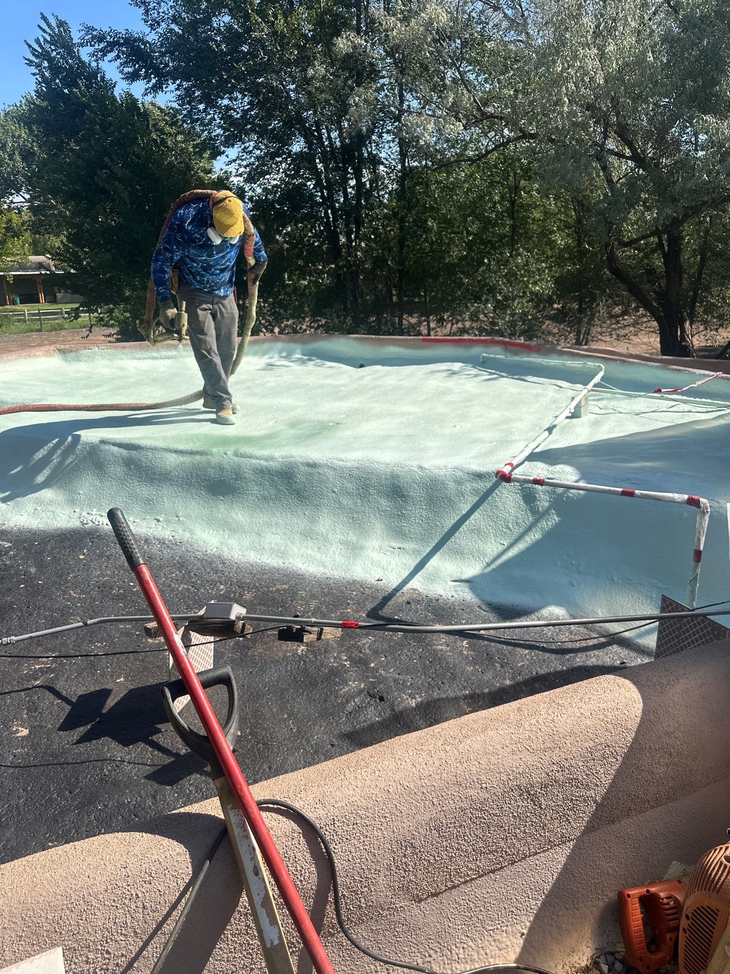 Residential roof application by SPF Services 