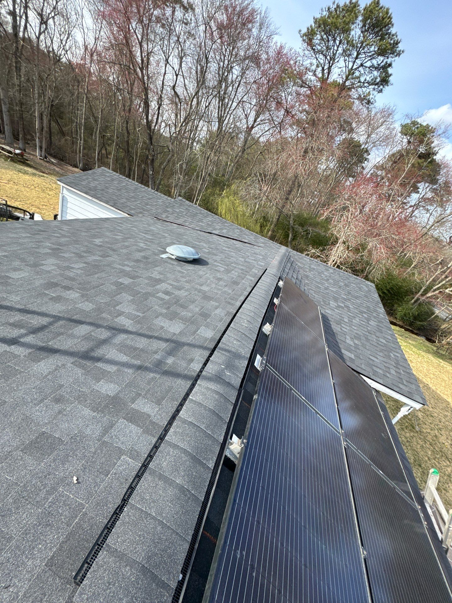 Onyx Black Shingles by Reimagine Roofing