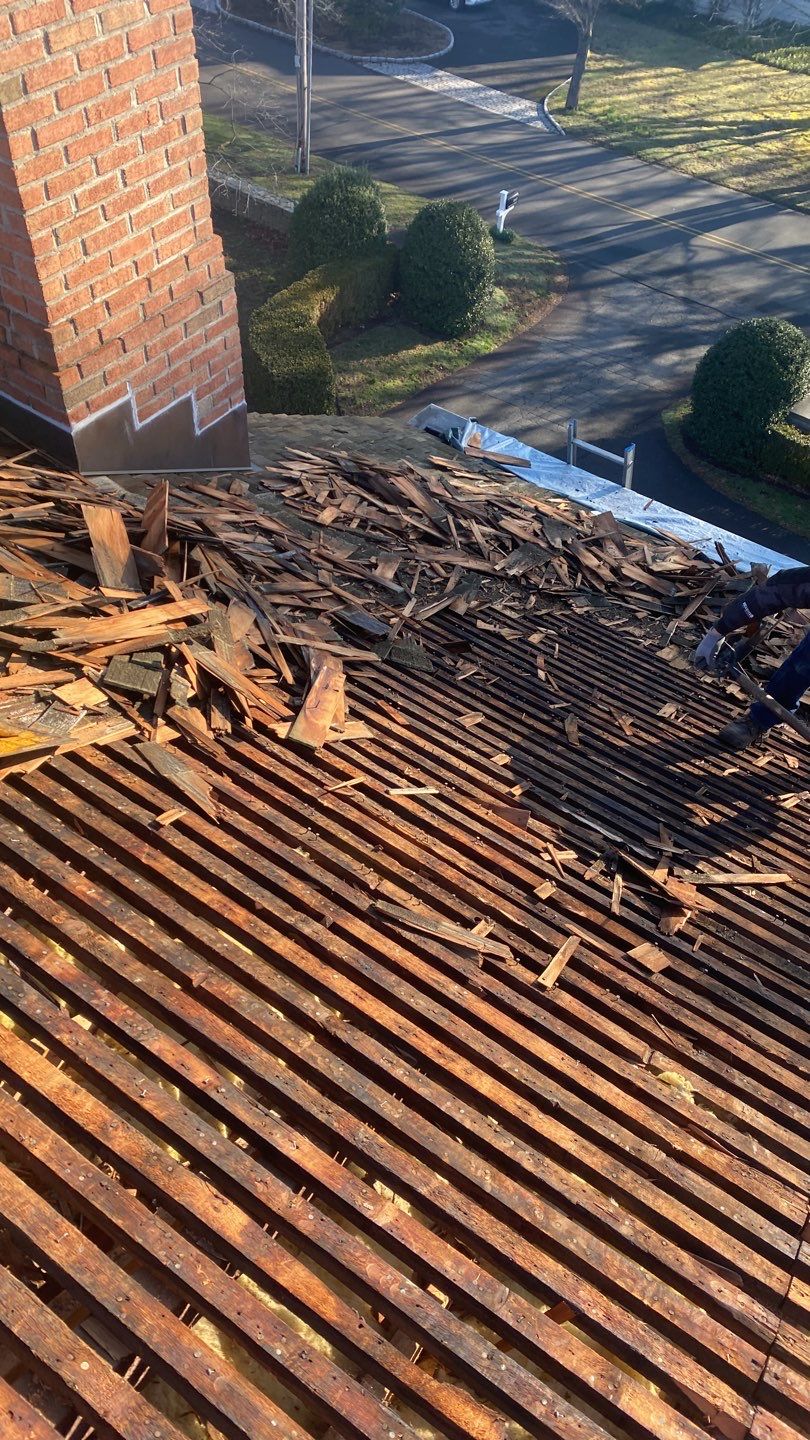 Residential Roofing Installation using Vermont Slate by A Plus Exterior