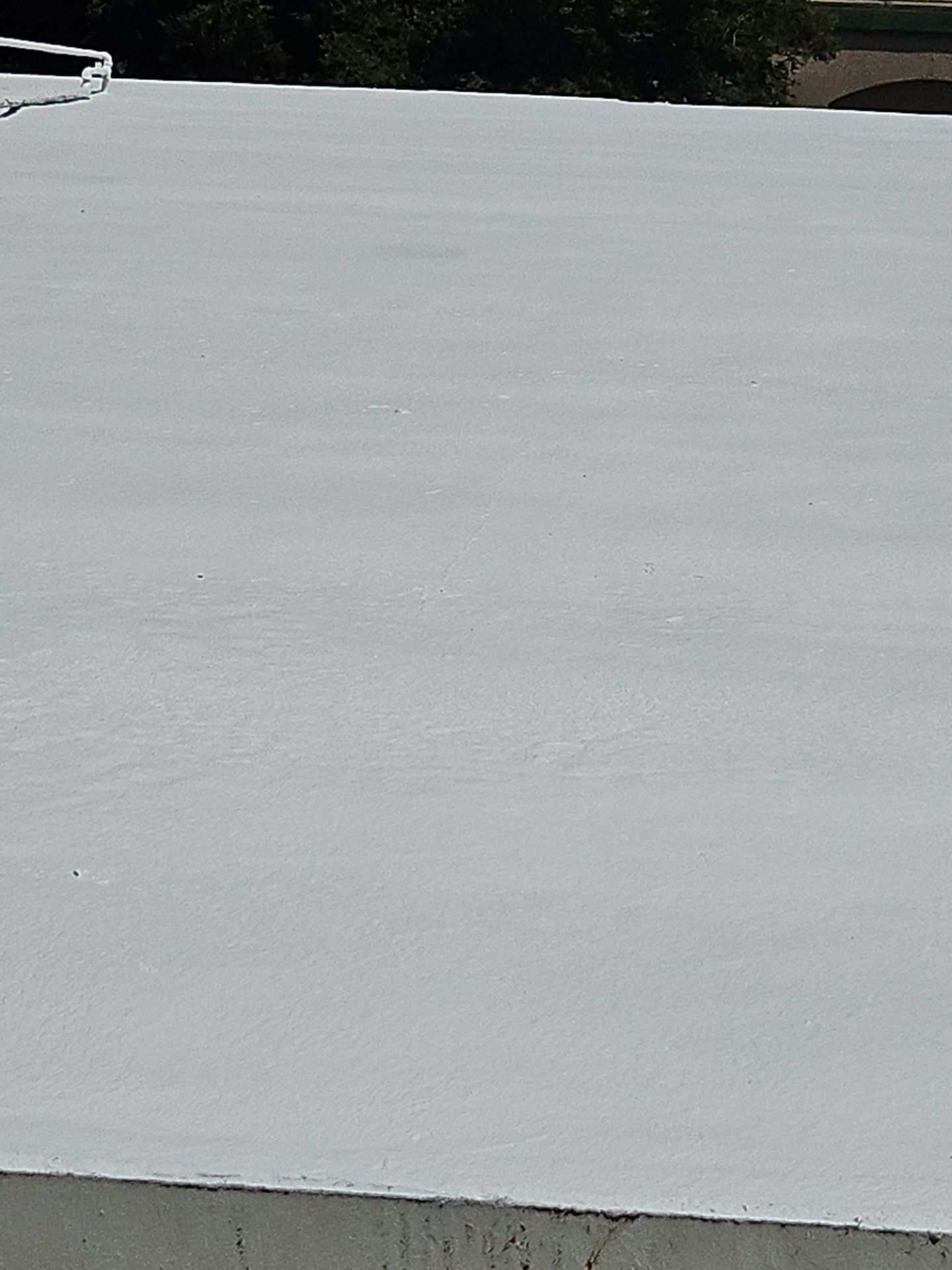 Foam Refurbish using General Coatings acrylic coatings and spray foam by Straight Edge Roofing Inc