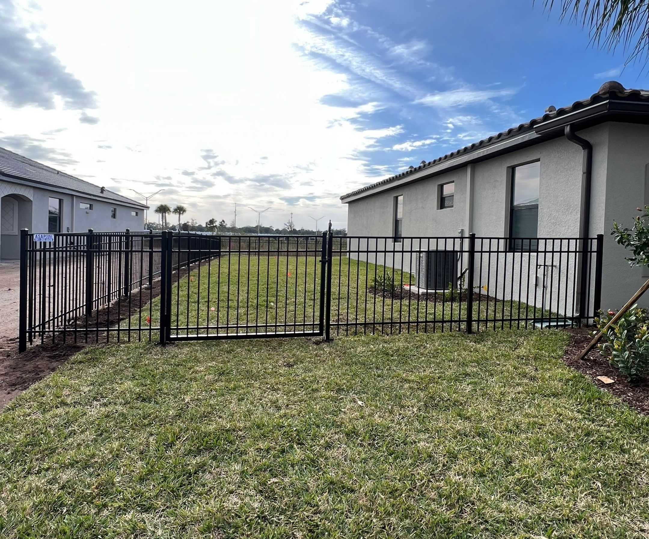 Aluminum Fence Installation using Black 3 Rail Aluminum Fence by Asap fence and gates, LLC