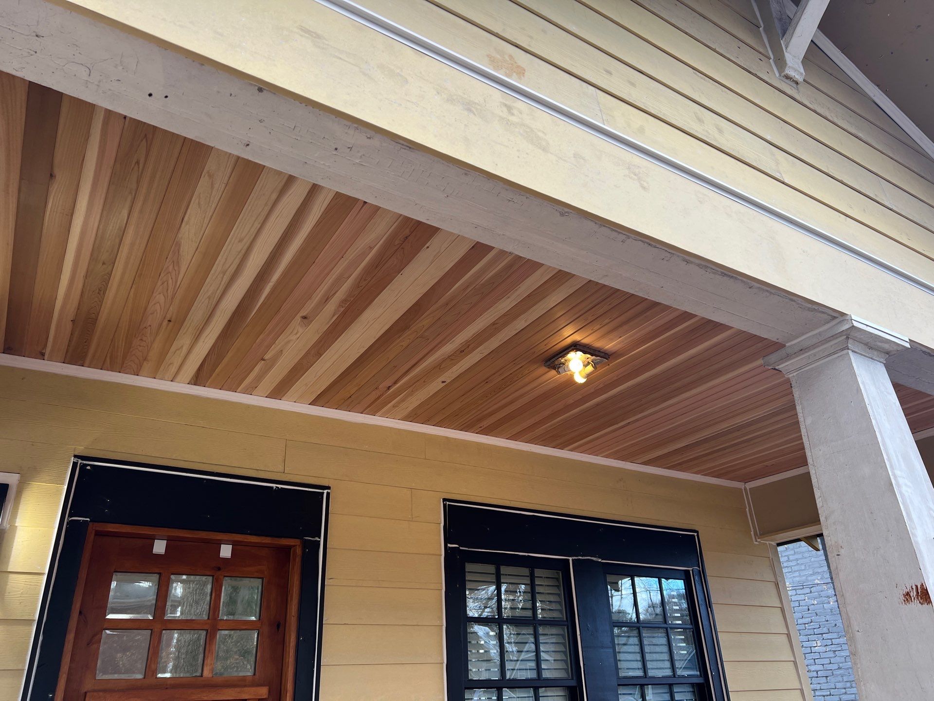 Cedar Tongue & Groove Porch Ceiling Installation Plus James Hardie Siding Replacement by Nelson Exteriors 