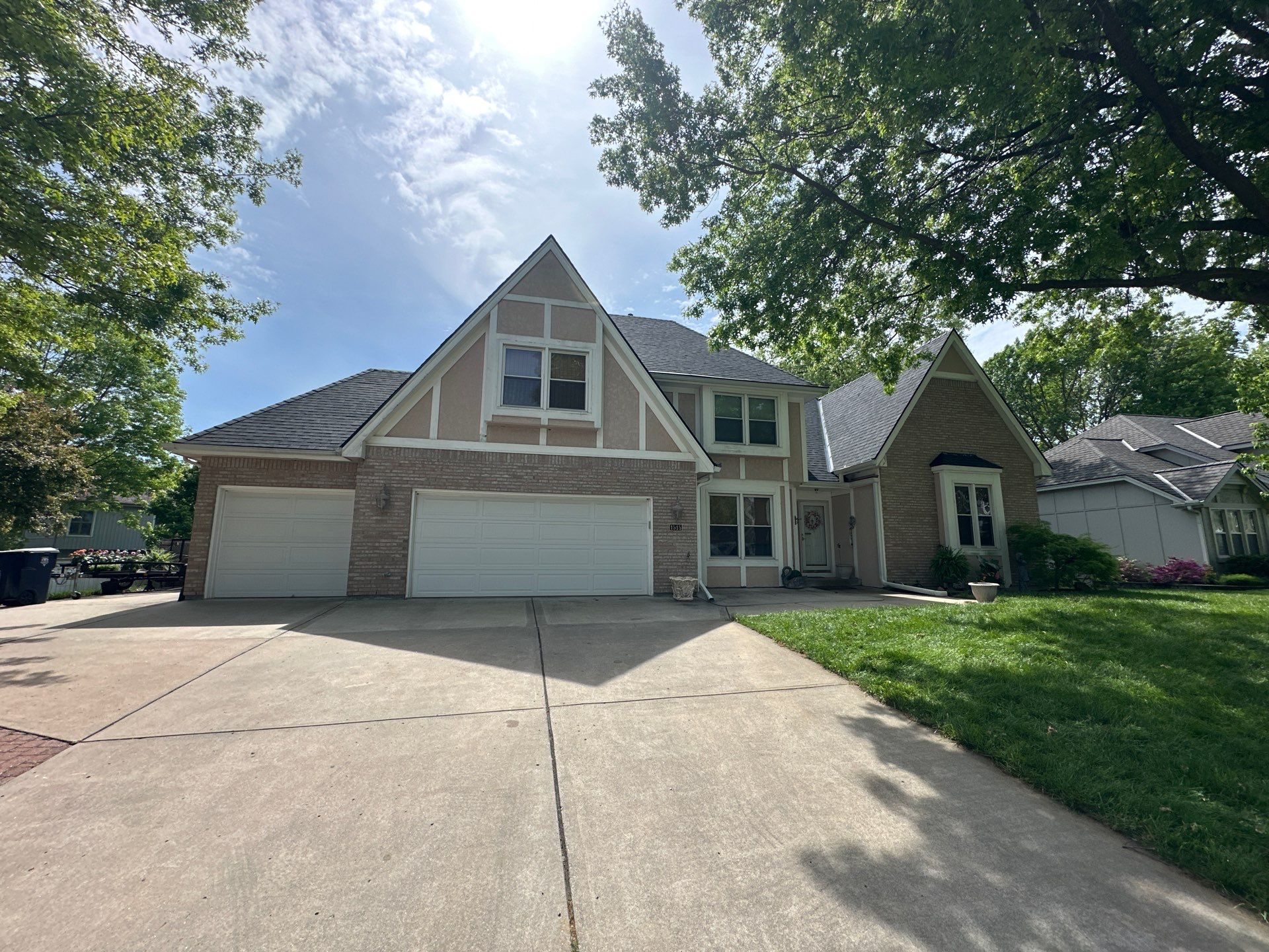 Comprehensive Roof Replacement and Skylight Installation in Kansas City by Liberty Roofing