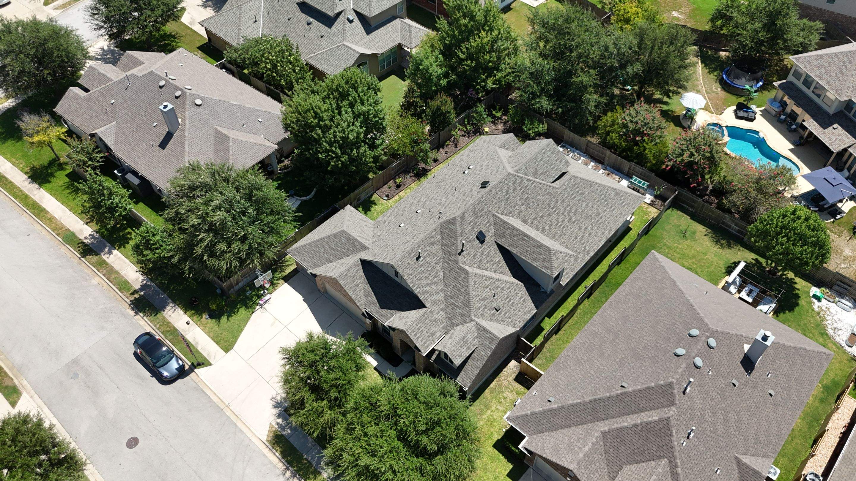 Residential Asphalt Shingle Roof Replacement and Solar Fan Installation by RoofsOnly.com