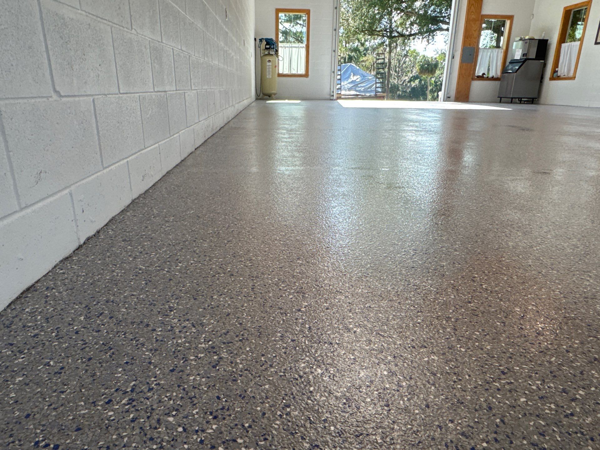 Garages Project in Micanopy, FL in Custom Color by Cross Creek Concrete Coatings
