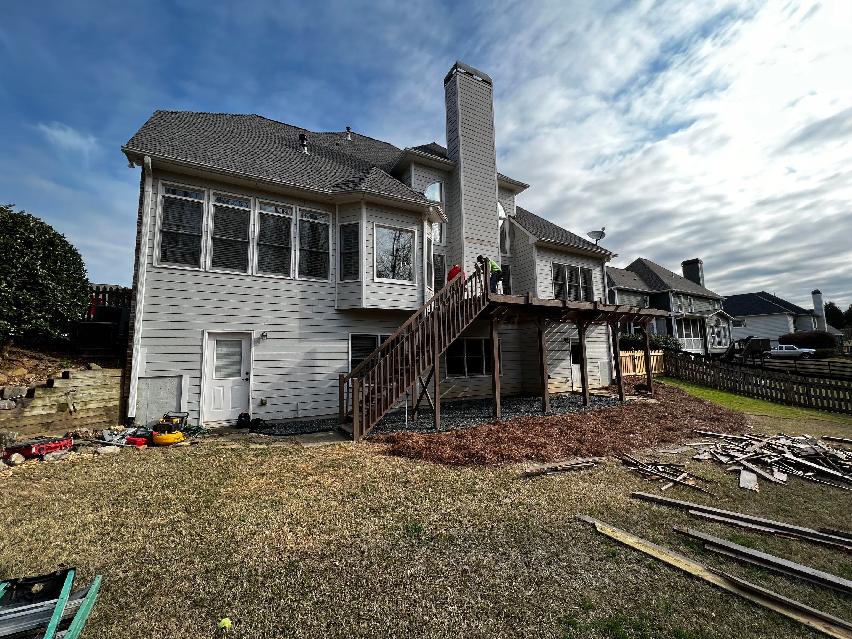 Elevated Grey Composite Deck Installation in Woodstock by Swift Home Renovations 