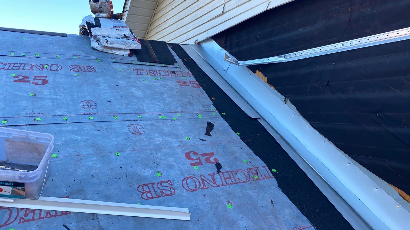 Residential Roofing Installation using Roof Replacement by American Roofing & Construction LLC
