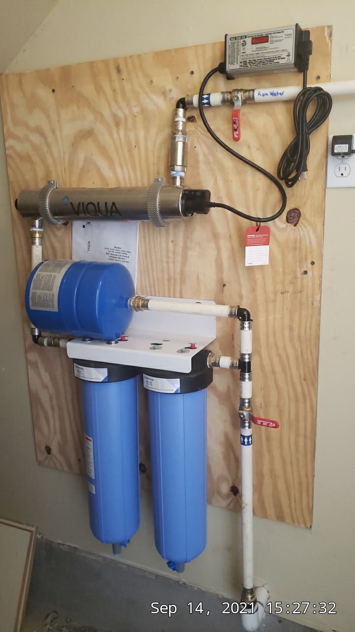 Cliffside installation for primary water source. by Hill Country Rain Water