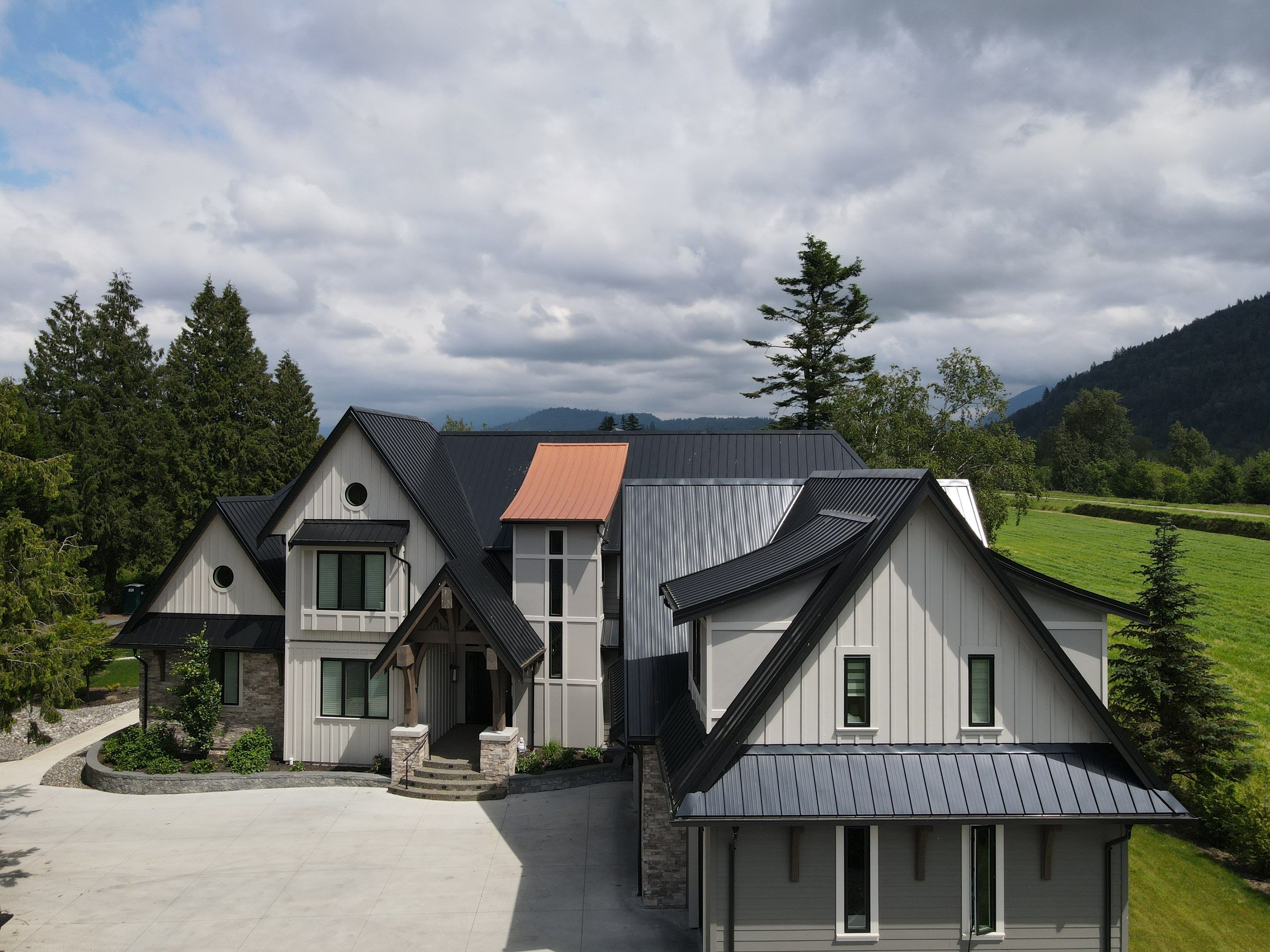 Commercial Roofing Installation using 12" Prolok metal  by Top Notch Roofing Inc