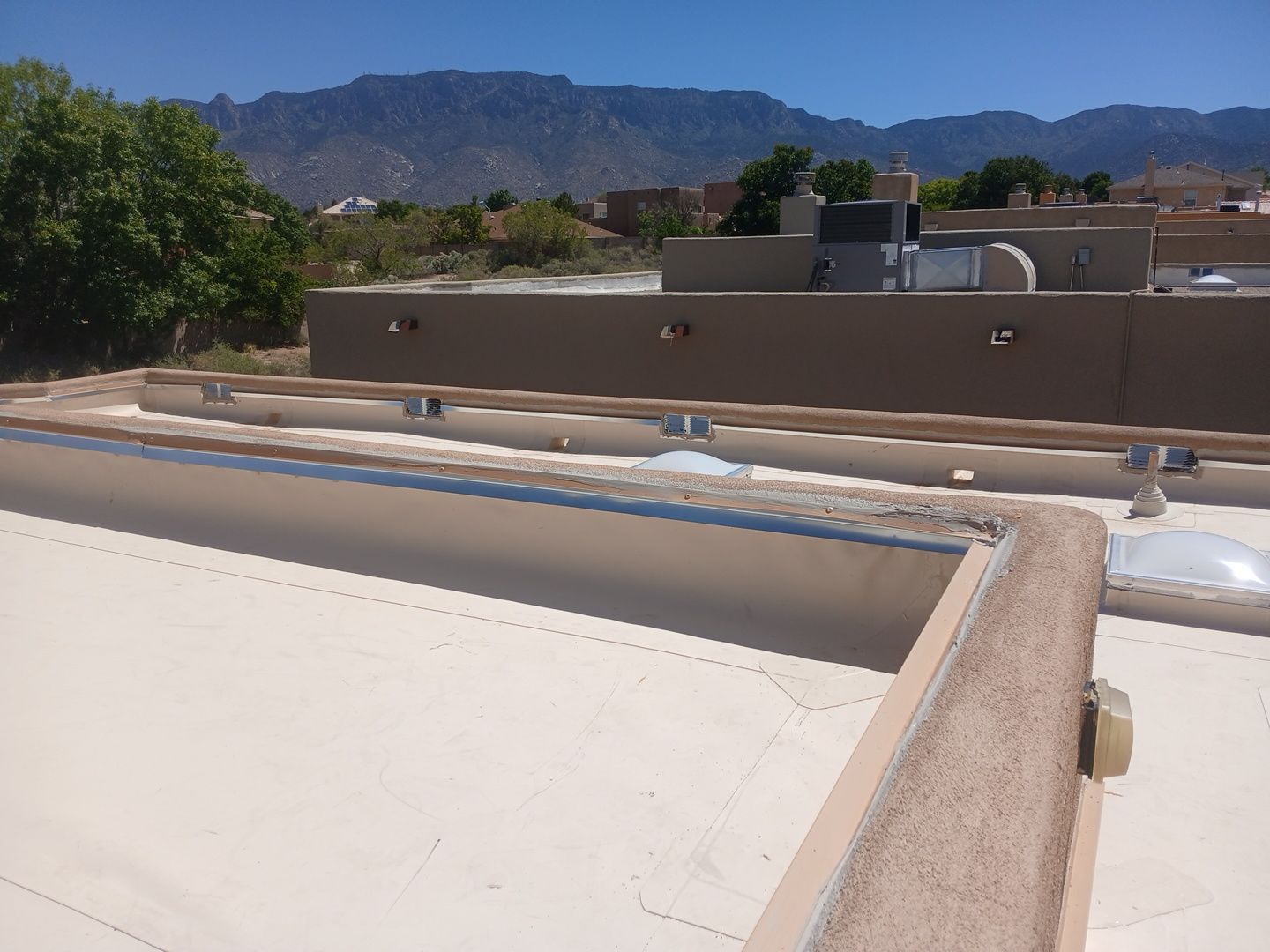 Albuquerque TPO Roof Replacement with Rigid Insulation and Skylights by Doyle Roof Masters Inc