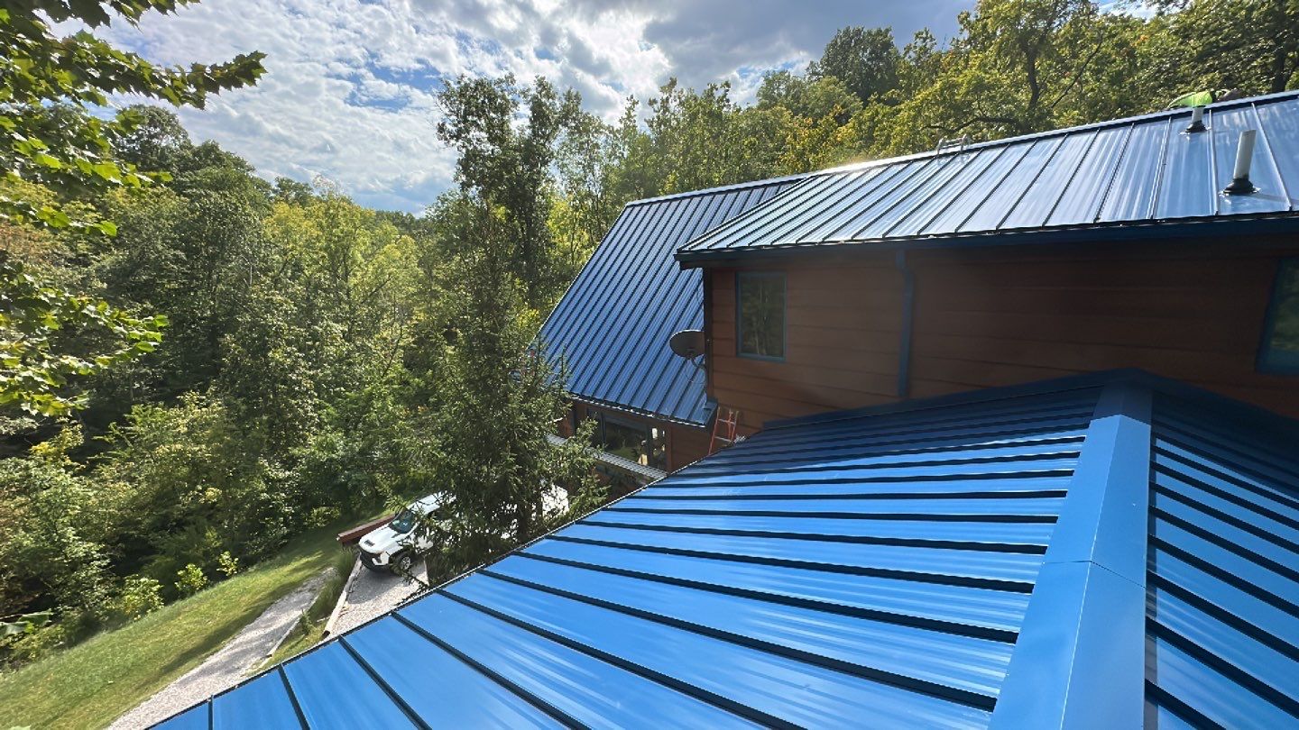 Residential Roofing Installation using Standing Seam Metal - Gallery Blue by RoofX 