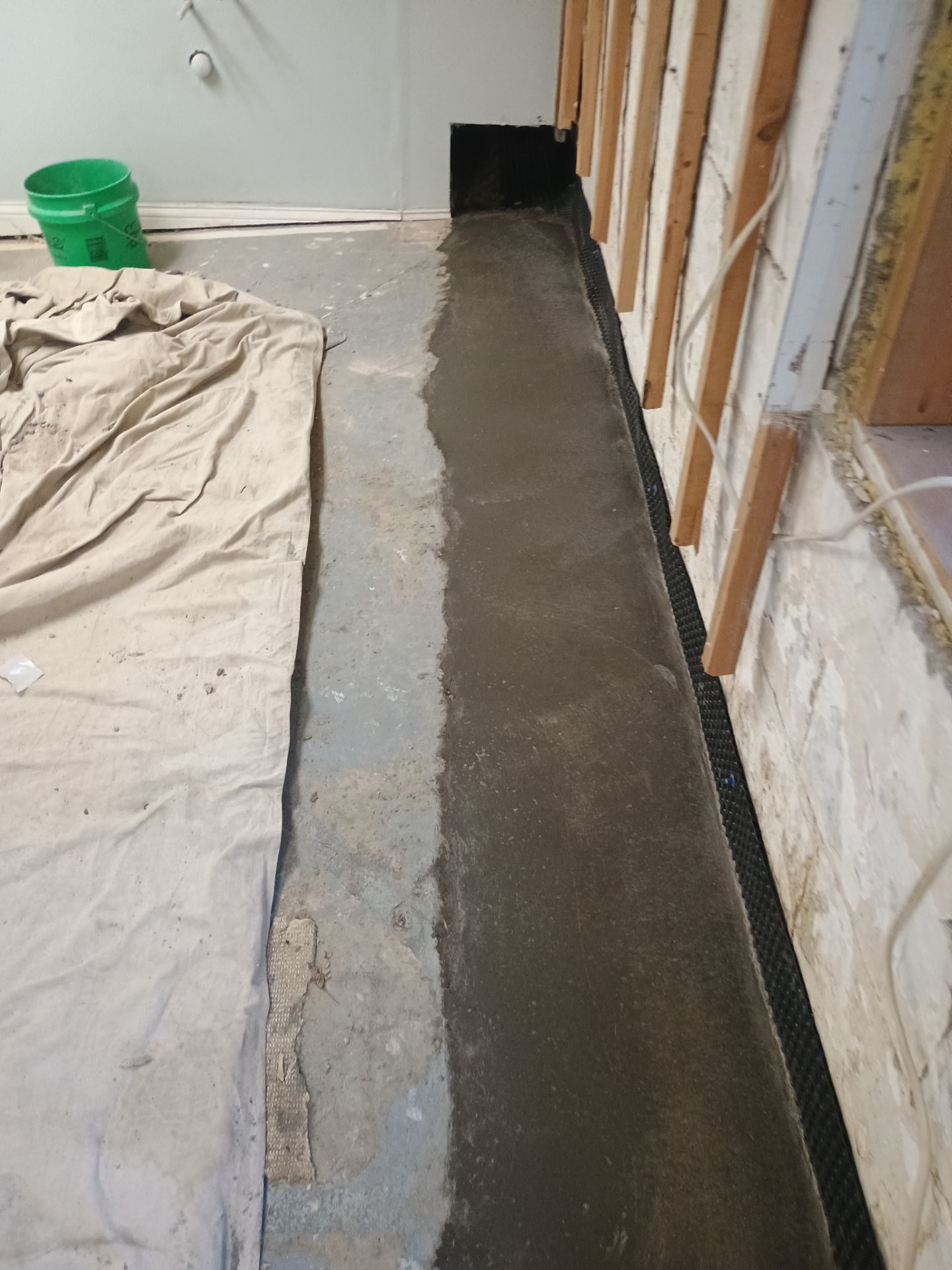 Interior Drain Tile Installation in South Minneapolis by Waterproofing Northeast