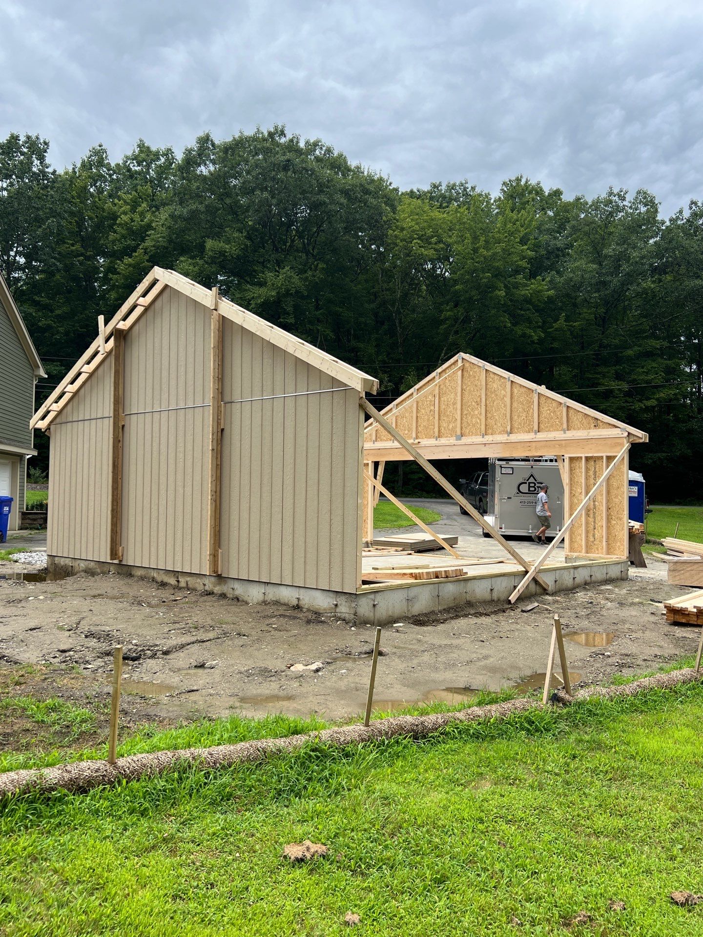 Two-Car Garage using LP SmartSide Panel Siding by Chagnon Building & Remodeling LLC