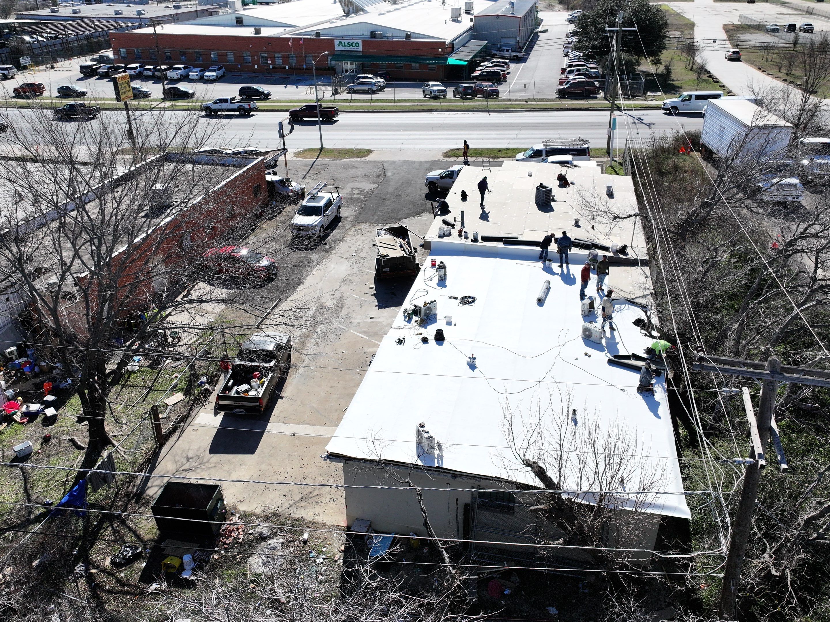 Commercial roofing overlay using GAF TPO over an old ballast roof by Becker Roofing and Exteriors