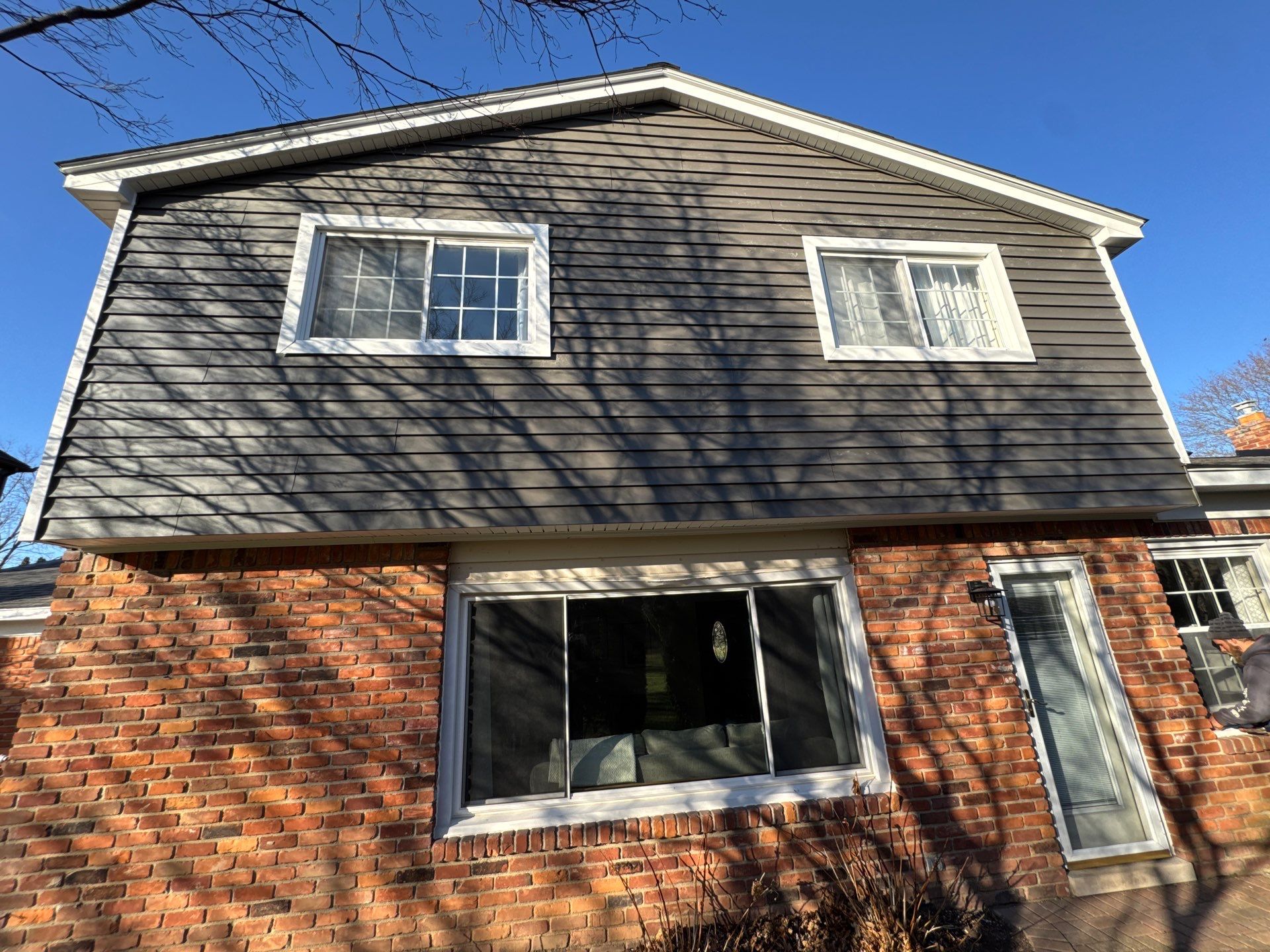 Siding Replacement using Alside Charcoal Smoke and Roof Replacement using Owens Corning Peppercorn by 180 Contractors