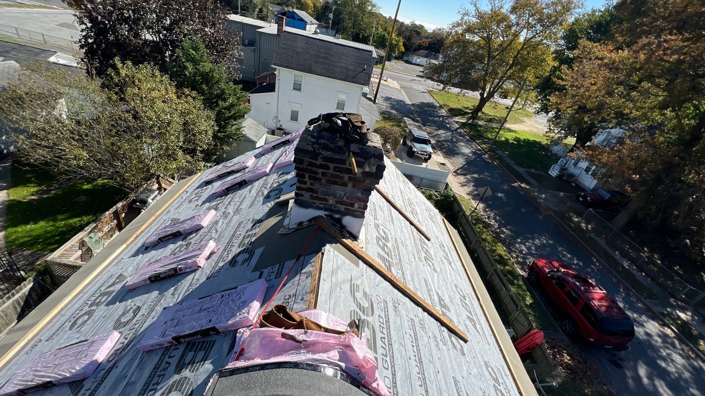 Onyx Black Shingles by Reimagine Roofing
