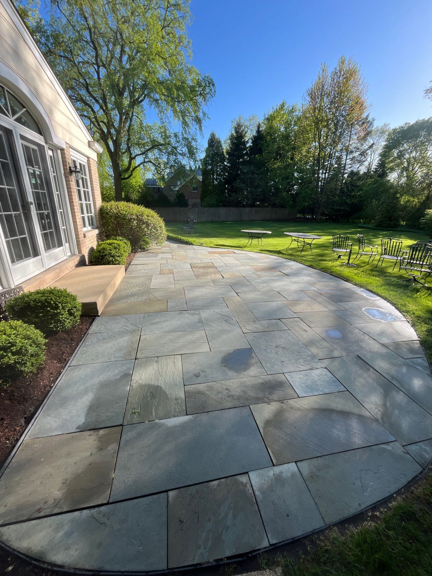 natural stone using Algaecide, soft wash soap by Northern Power Washing LLC.