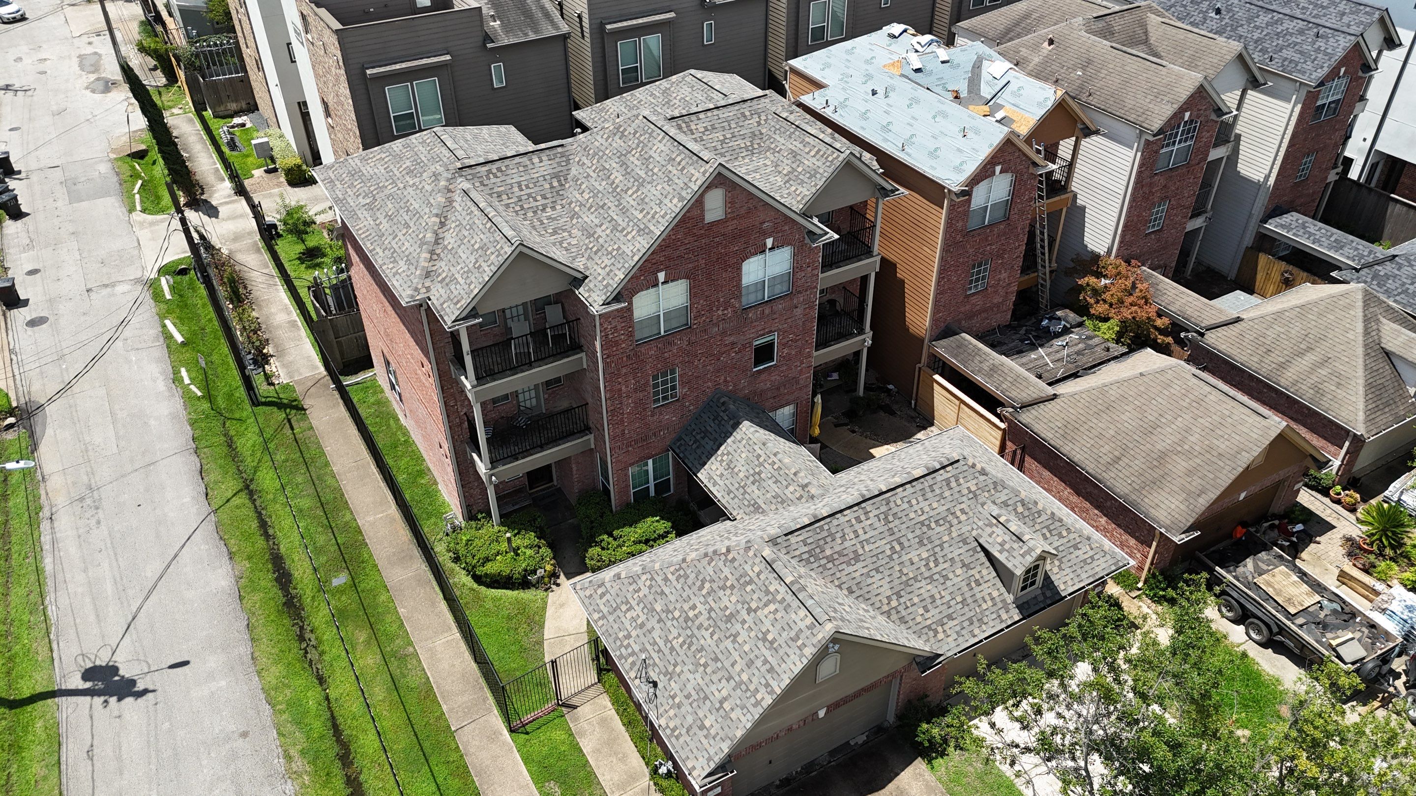 Residential Roofing Installation on a Highrise Duplex using IKO Dynasty by Core Four Roofing