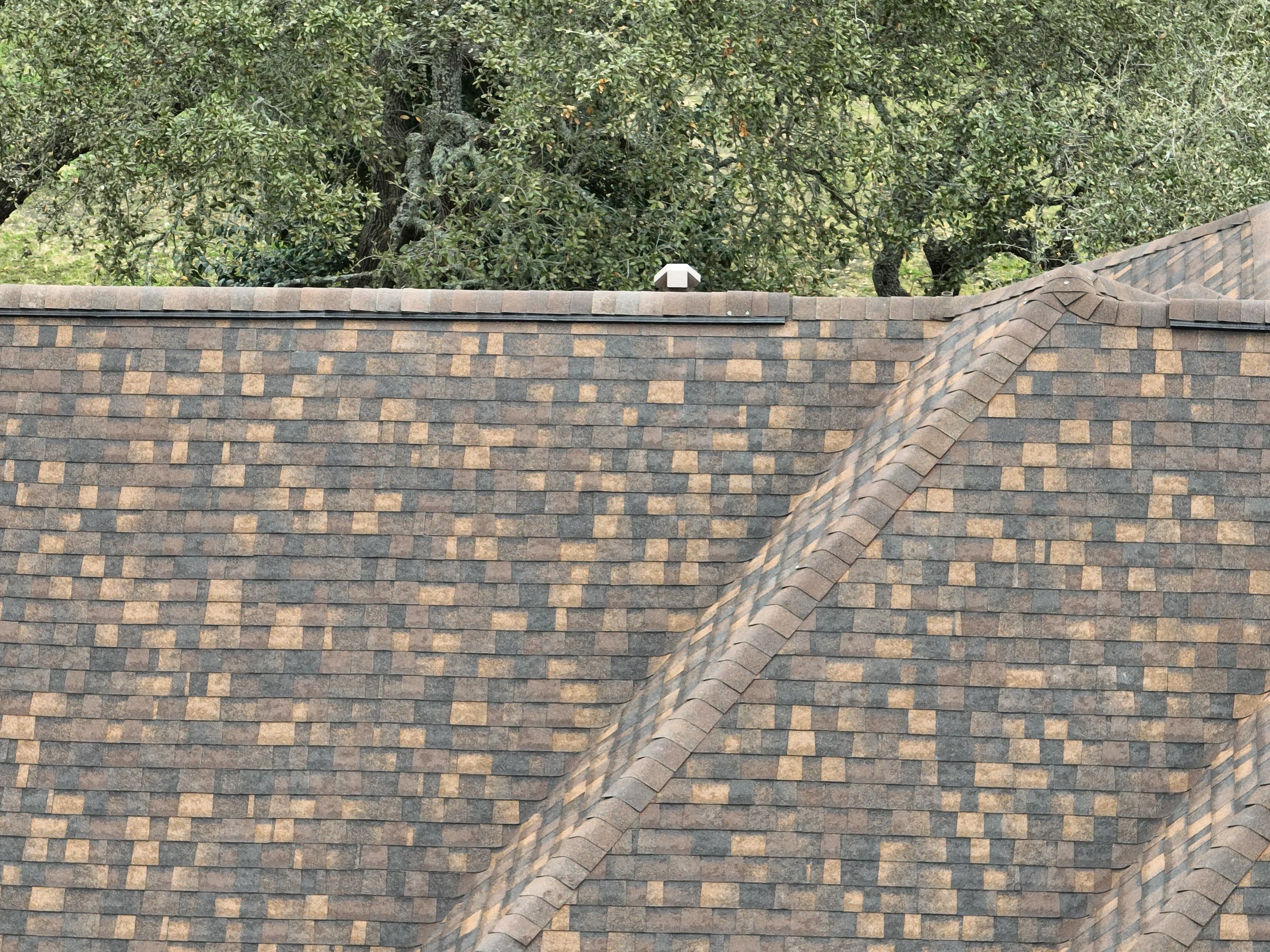 Residential Roof Replacement using 30 Year Laminate Shingles with High Profile Ridge by Premier Roofing and Contracting