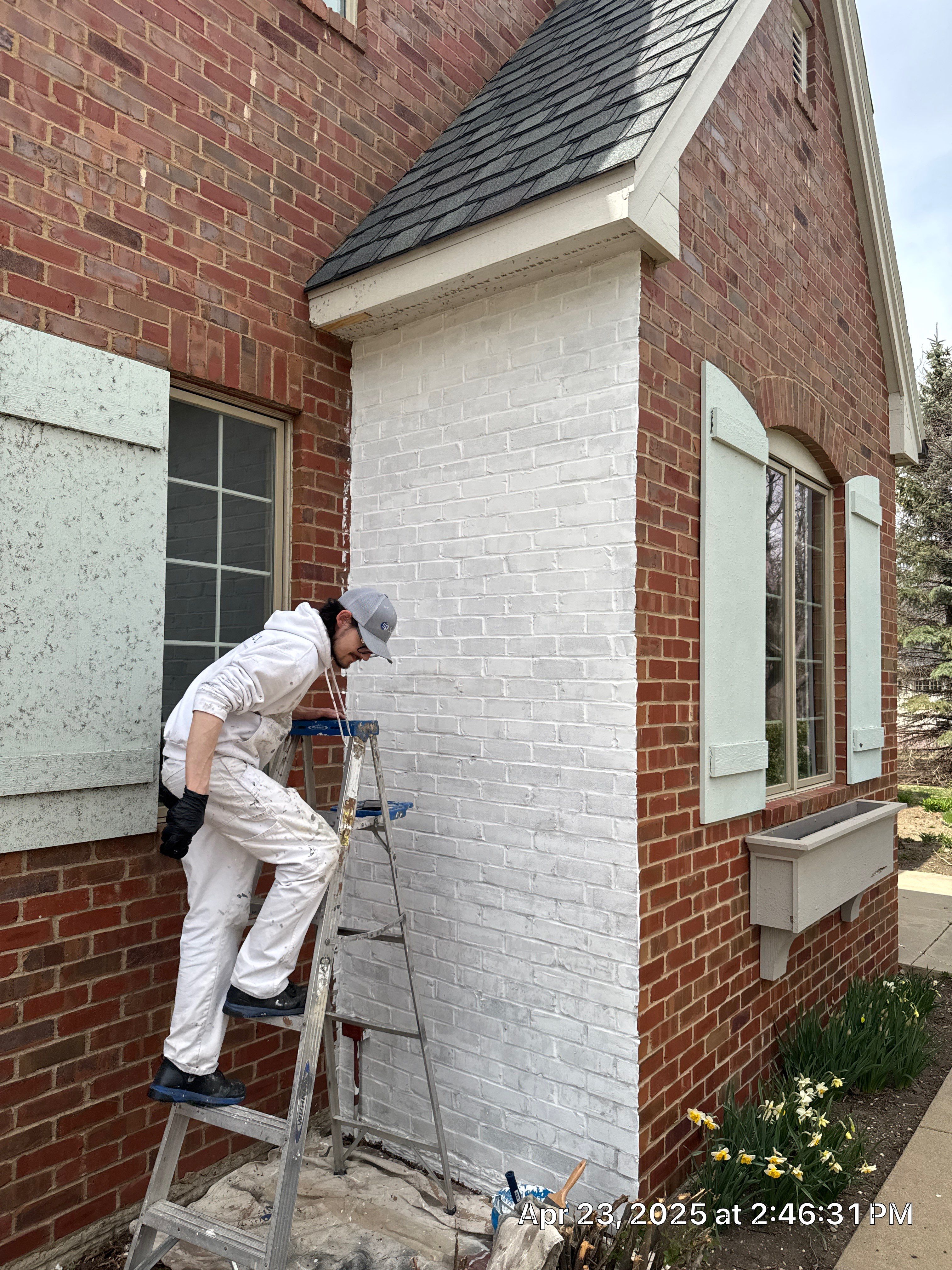Residential Exterior Brick Painting and Limewash Refresh in Sioux Falls by Select Painting, Coatings & Garage Cabinets