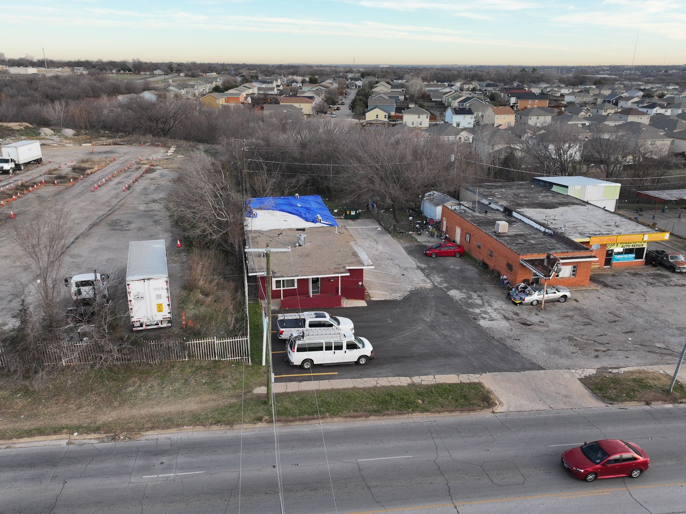 Commercial roofing overlay using GAF TPO over an old ballast roof by Becker Roofing and Exteriors