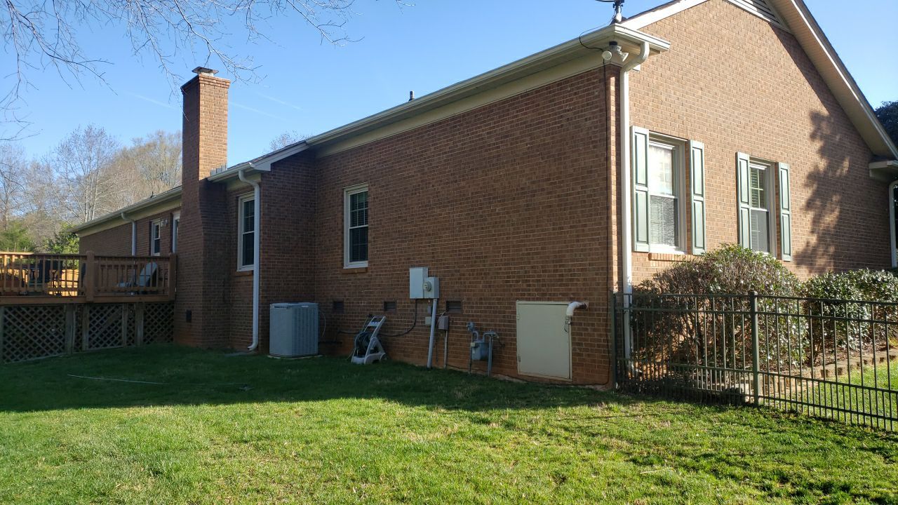 House Wash using cleaner by Power Wash Masters LLC